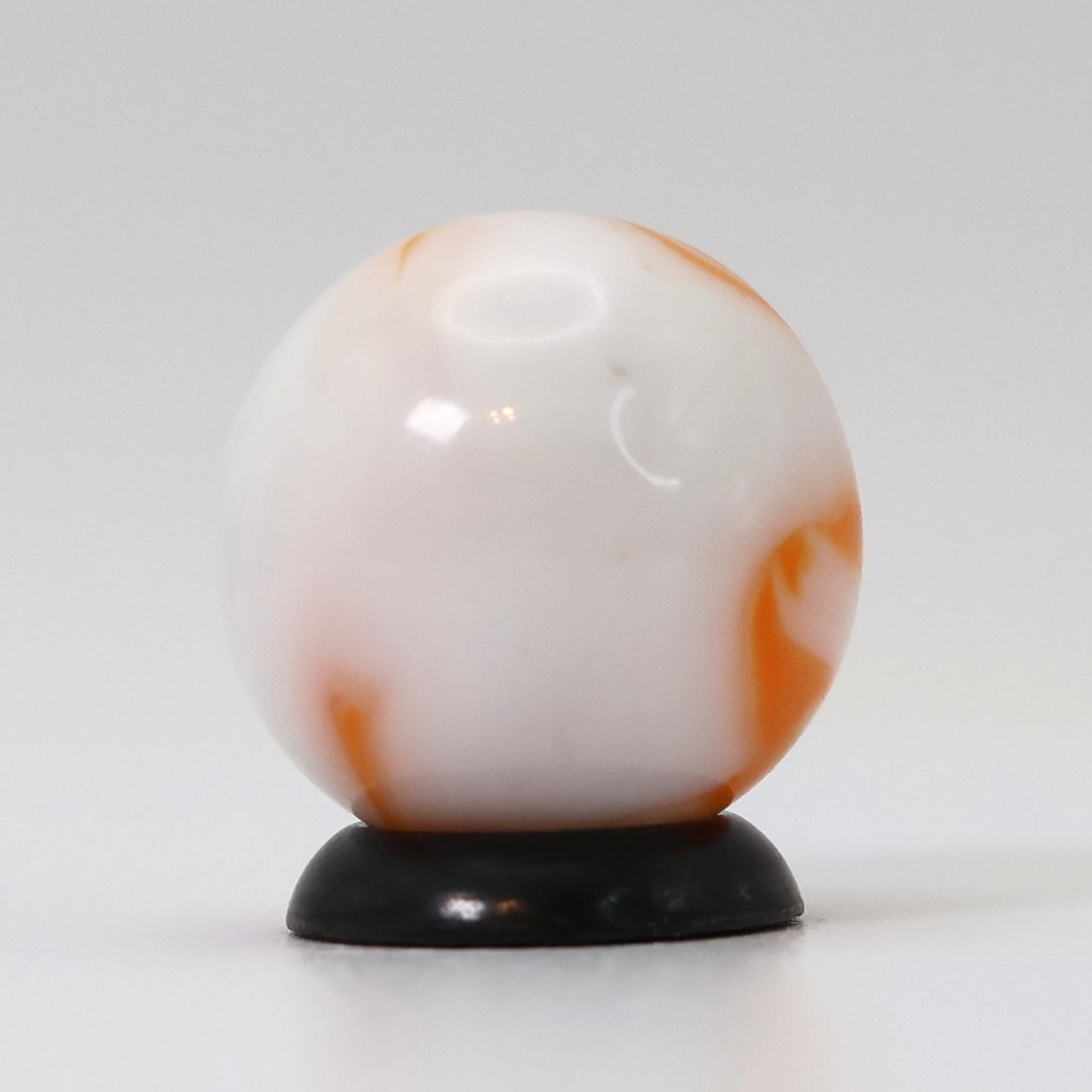 5/8" Swirl Marble Translucent White Base with orange ribbons M-