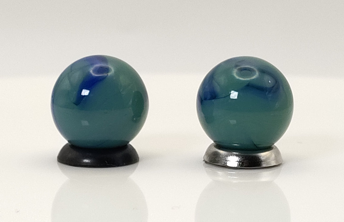5/8" 2pk green/ blue swirl Marbles - Ravenswood? NM+