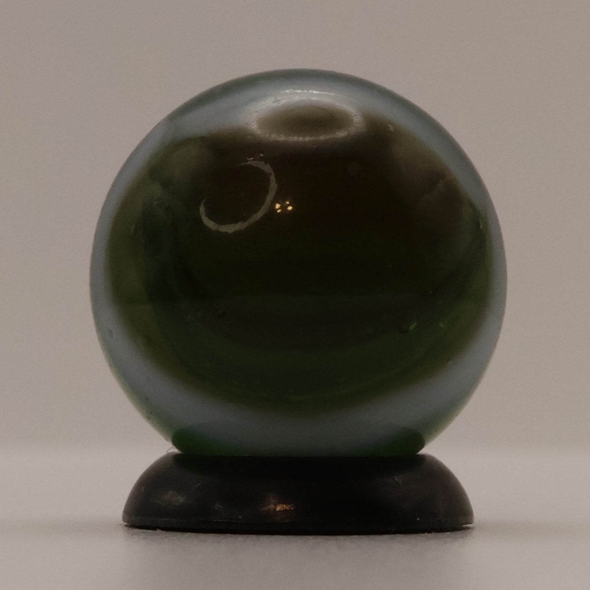 5/8" Peltier Rainbo Marble Translucent Green with white ribbons M-