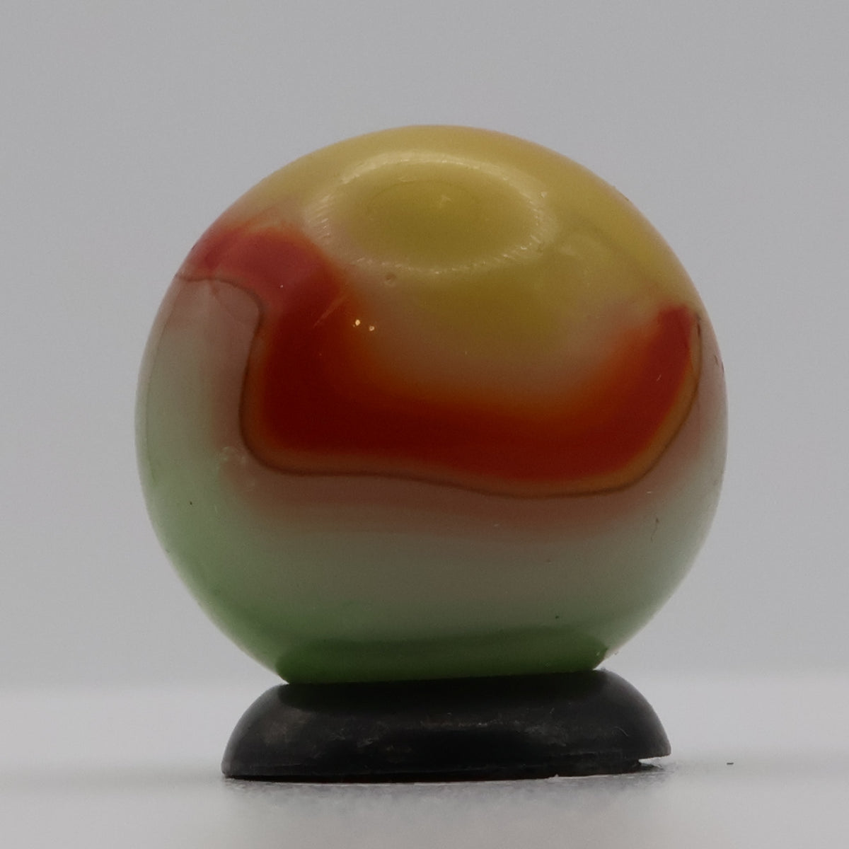 11/16" Vitro Agate Marble Parrot/Parakeet strip of oxblood NM-