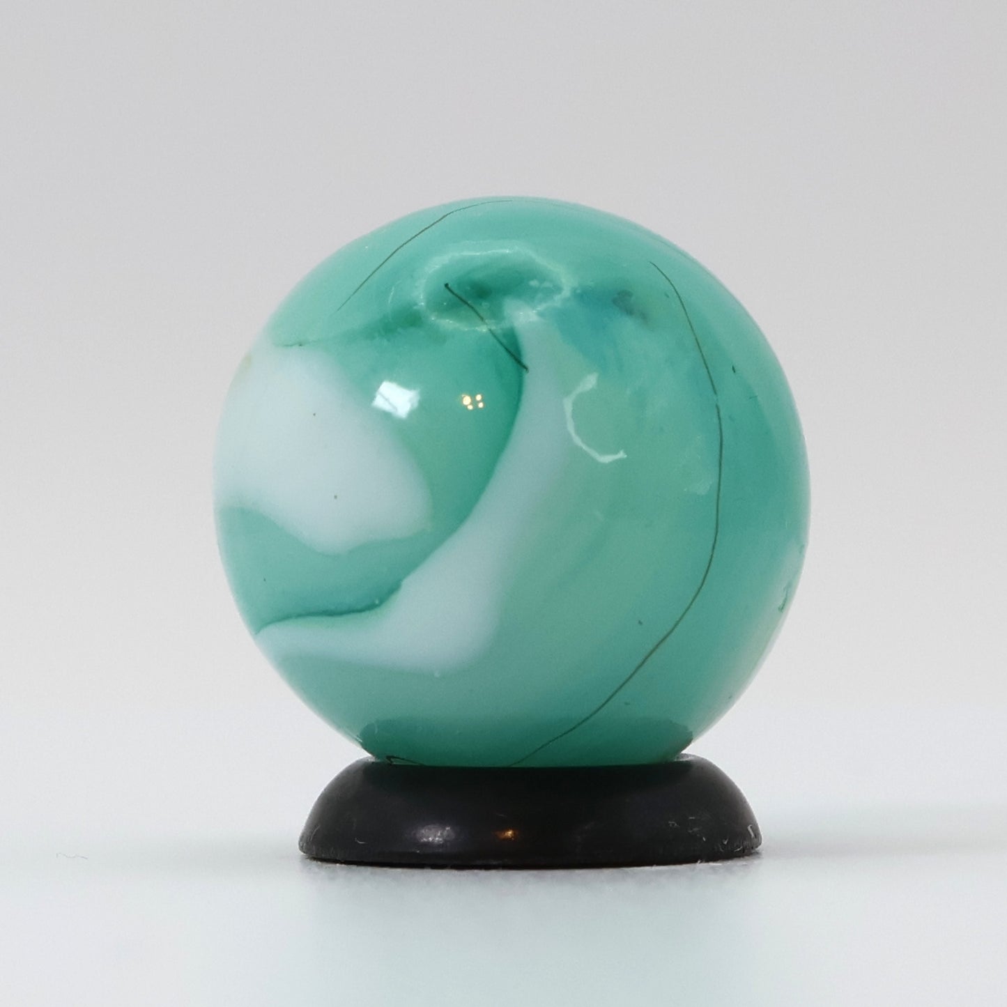 11/16" Swirl Marble Teal, White, horsehair oxblood swirl NM+