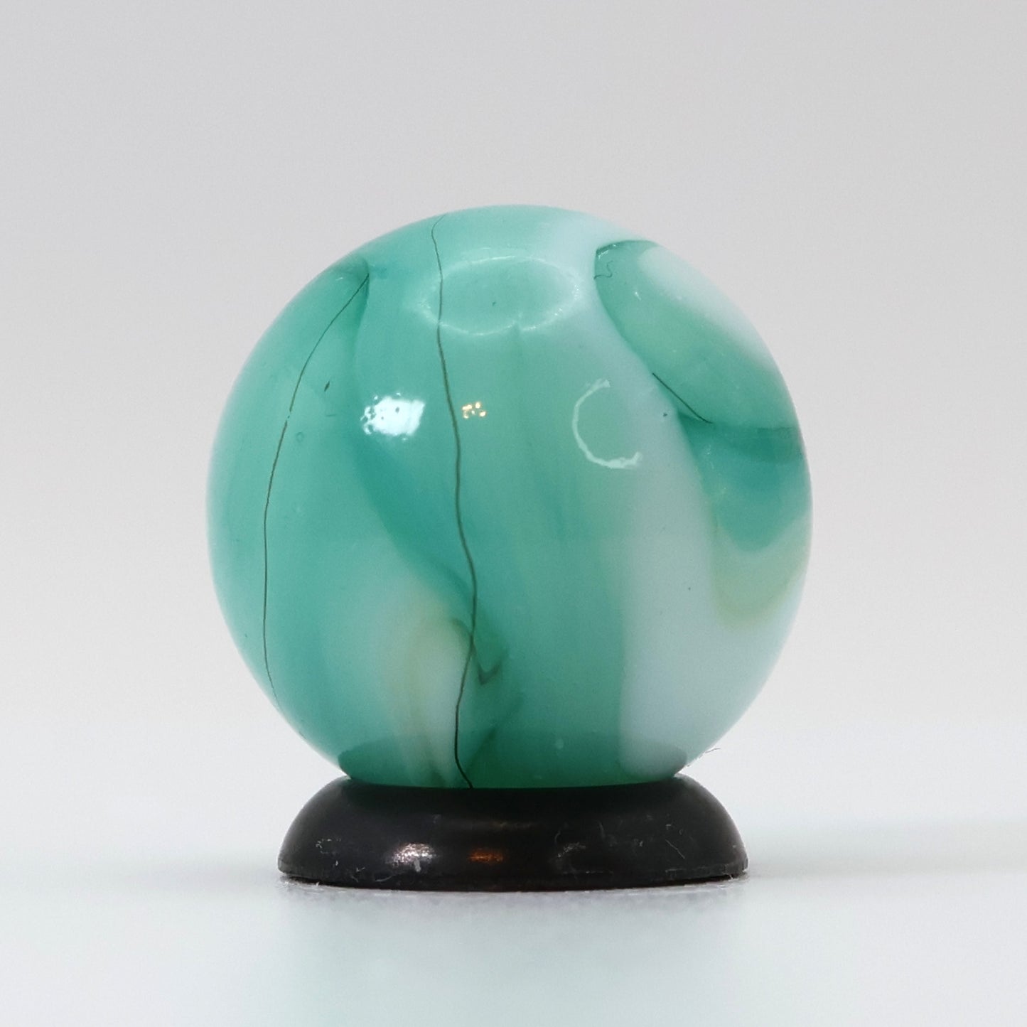 11/16" Swirl Marble Teal, White, horsehair oxblood swirl NM+