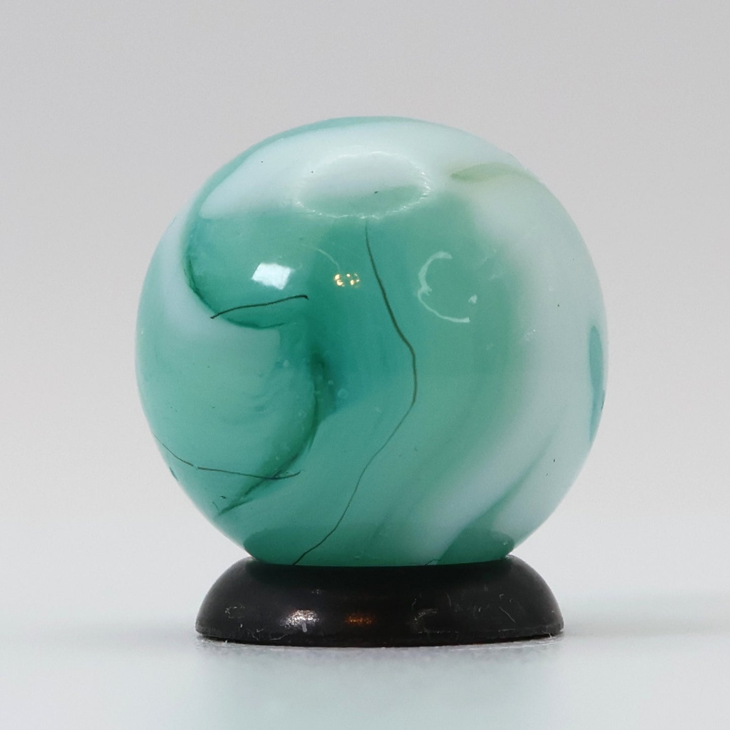 11/16" Swirl Marble Teal, White, horsehair oxblood swirl NM+