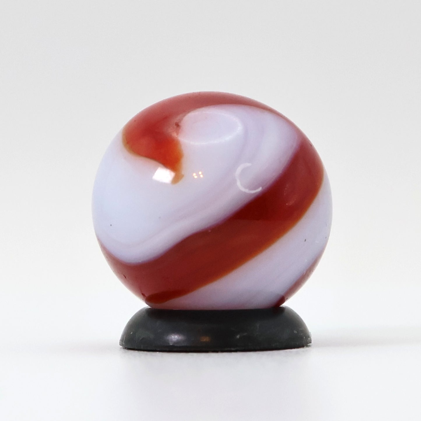 5/8" Akro Agate Corkscrew marble white base, translucent red stripe NM-