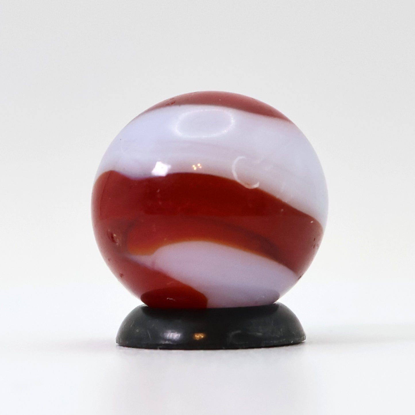5/8" Akro Agate Corkscrew marble white base, translucent red stripe NM-