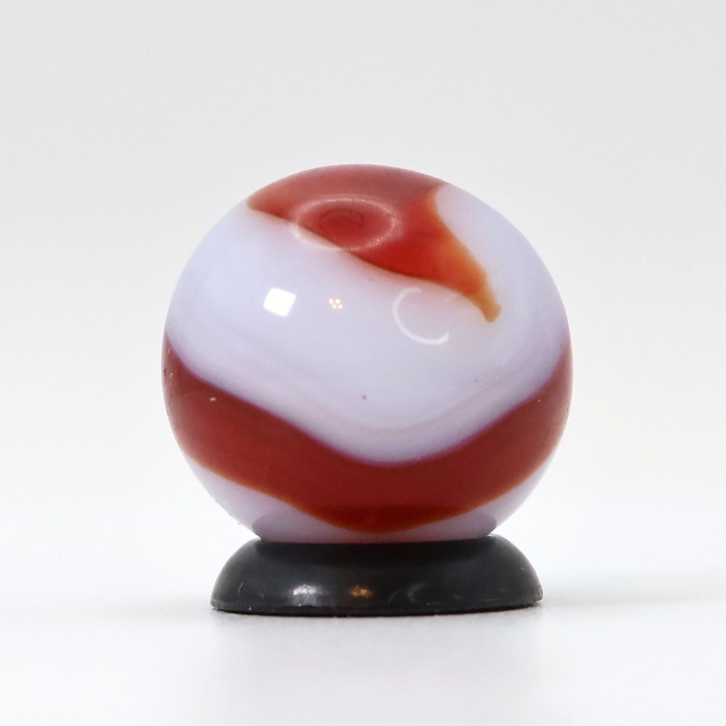 5/8" Akro Agate Corkscrew marble white base, translucent red stripe NM-
