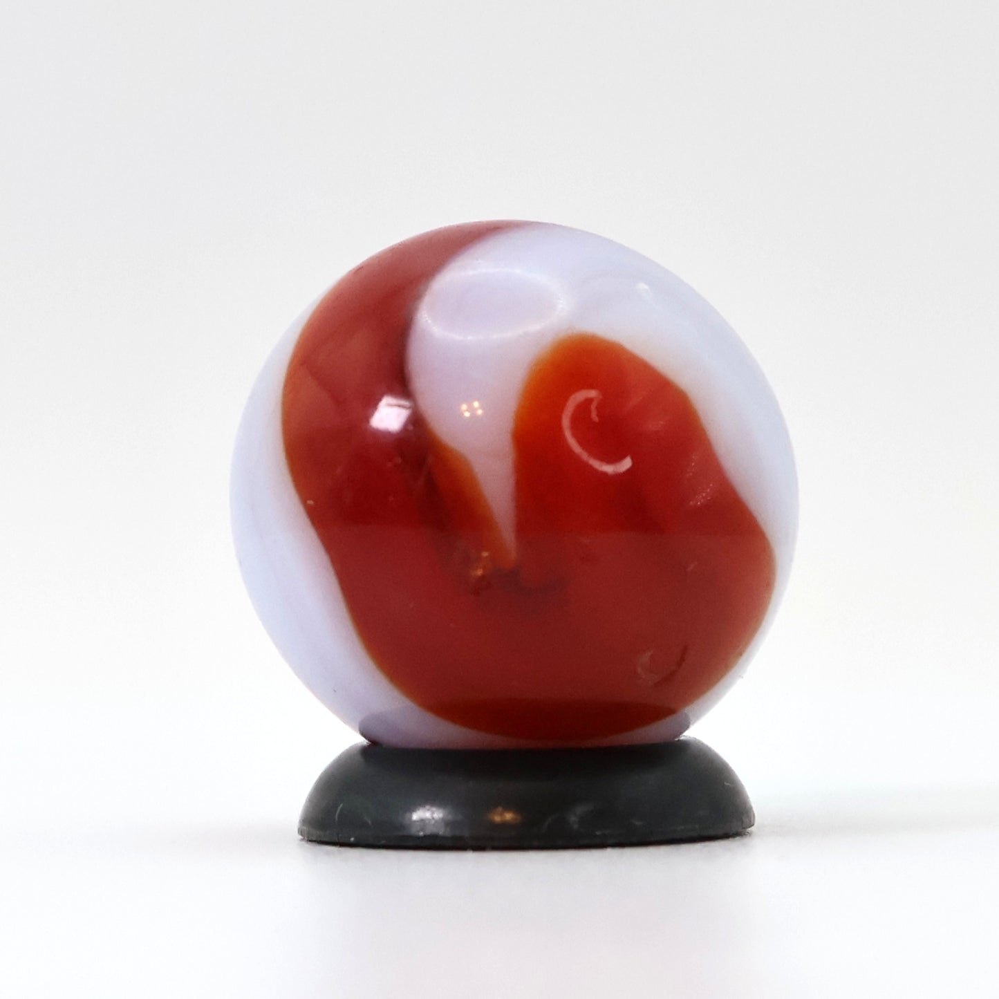 5/8" Akro Agate Corkscrew marble white base, translucent red stripe NM-
