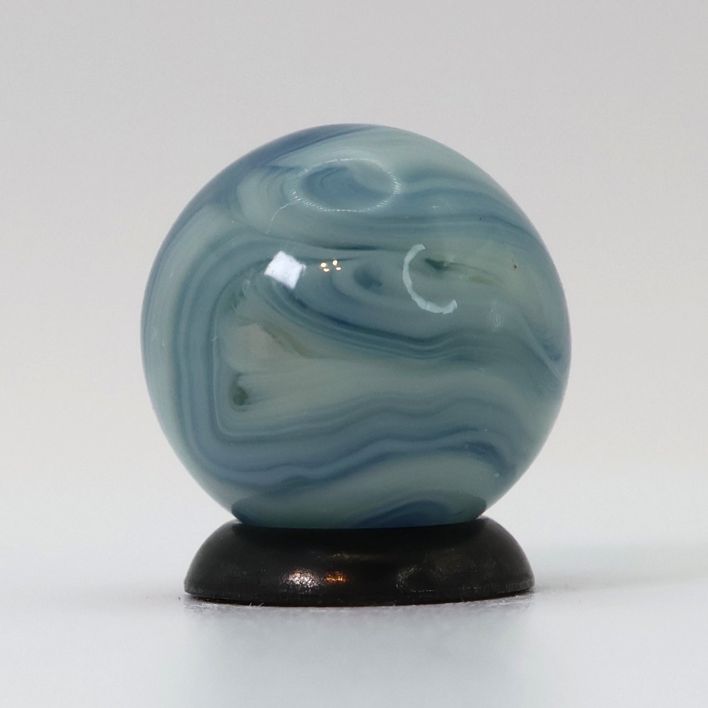 5/8" Busy Swirl Marble translucent blue base with white ribbons M-