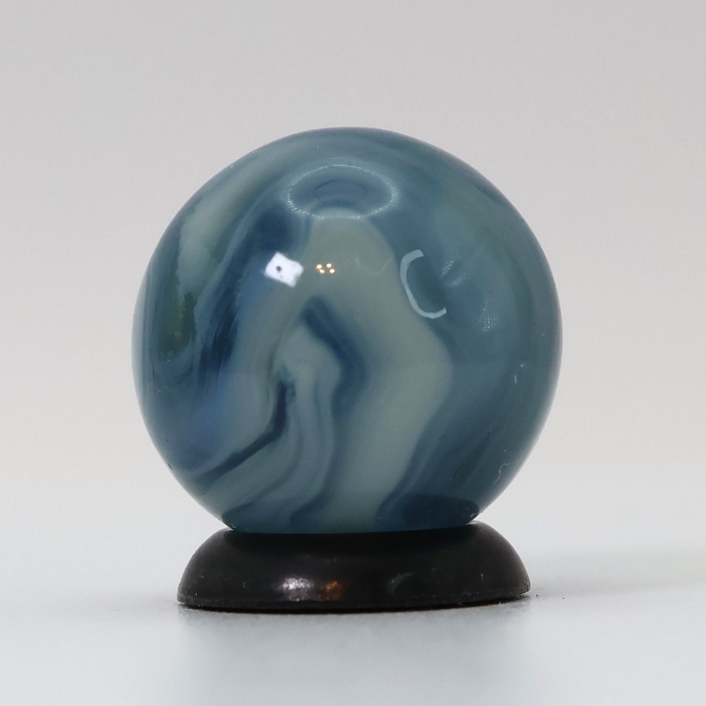 5/8" Busy Swirl Marble translucent blue base with white ribbons M-