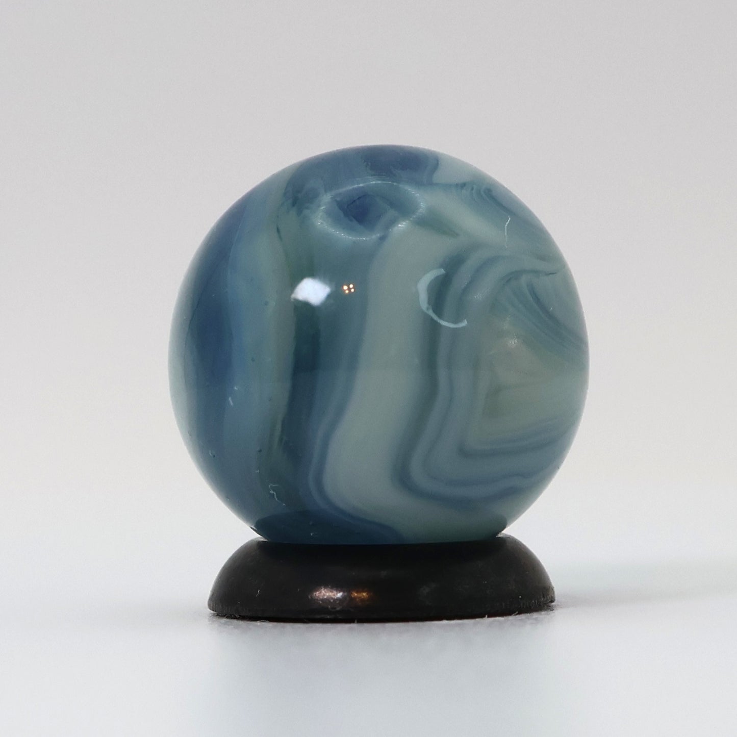 5/8" Busy Swirl Marble translucent blue base with white ribbons M-