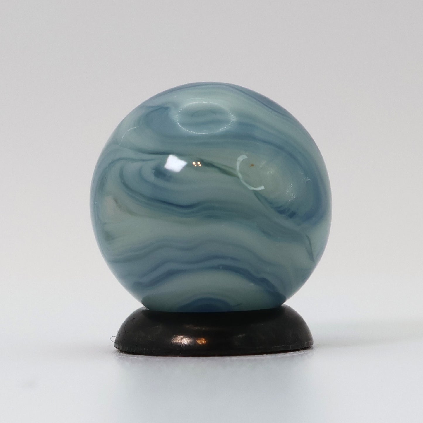5/8" Busy Swirl Marble translucent blue base with white ribbons M-