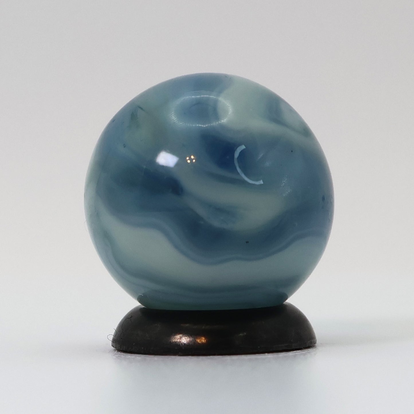 5/8" Busy Swirl Marble translucent blue base with white ribbons M-