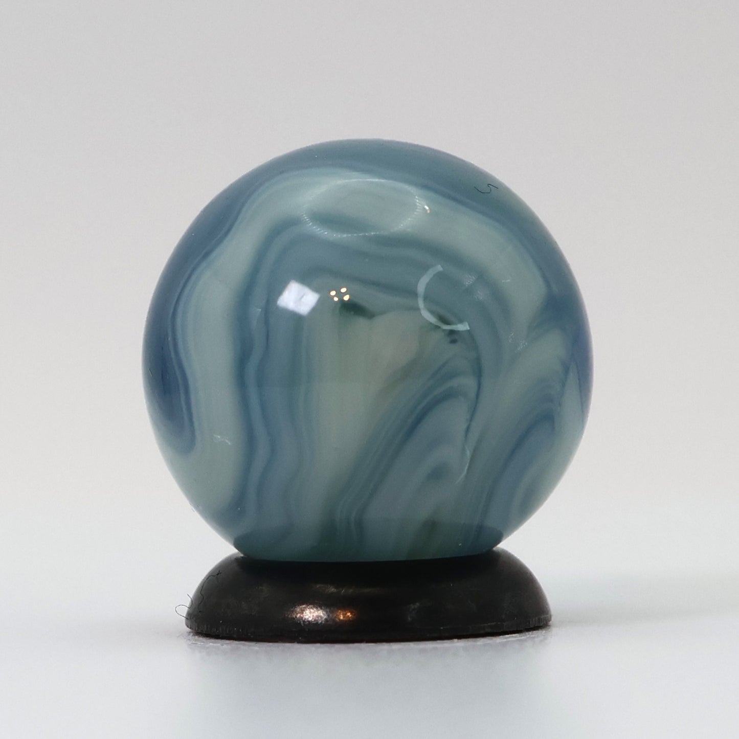 5/8" Busy Swirl Marble translucent blue base with white ribbons M-