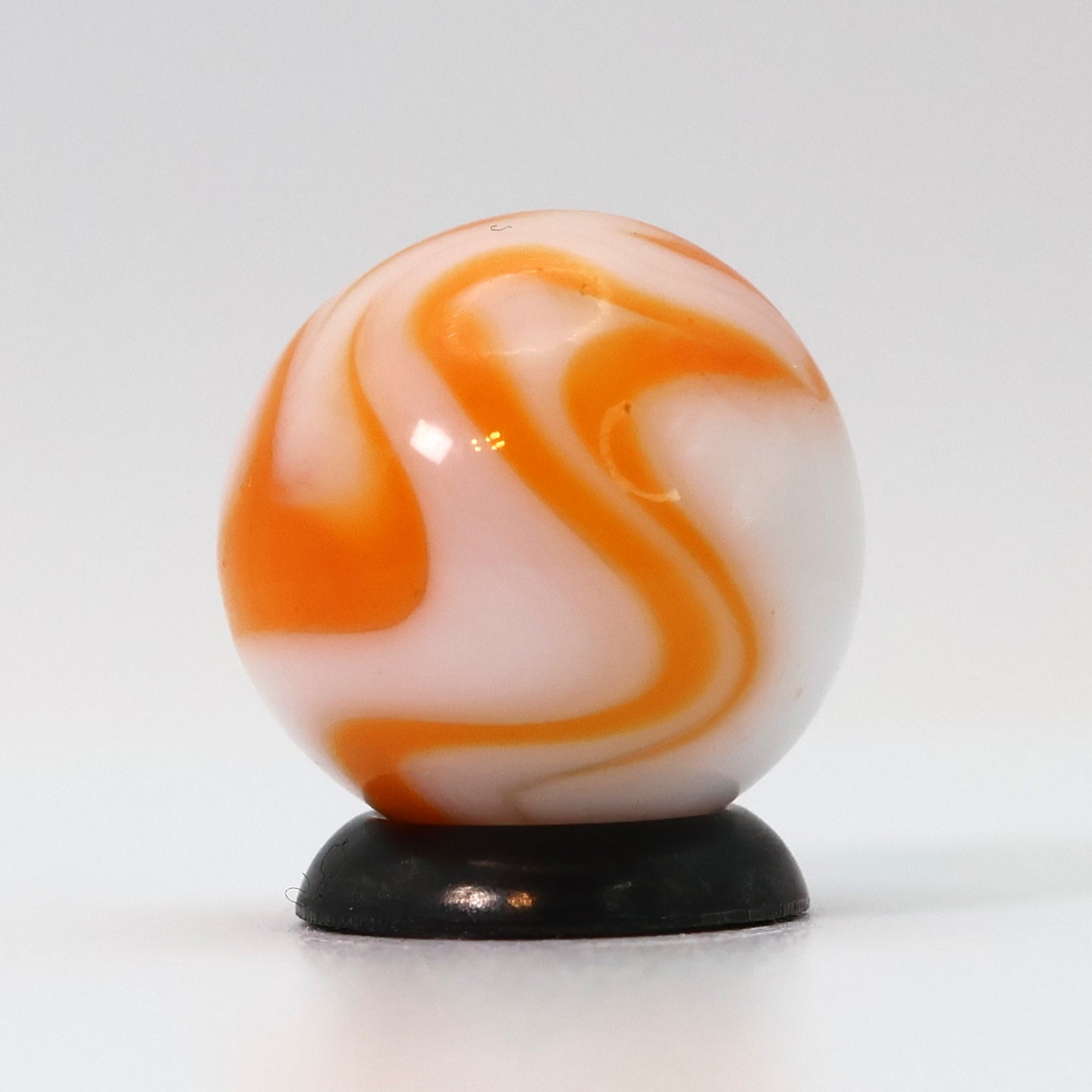 5/8" Swirl Marble Translucent White Base with orange ribbons M-