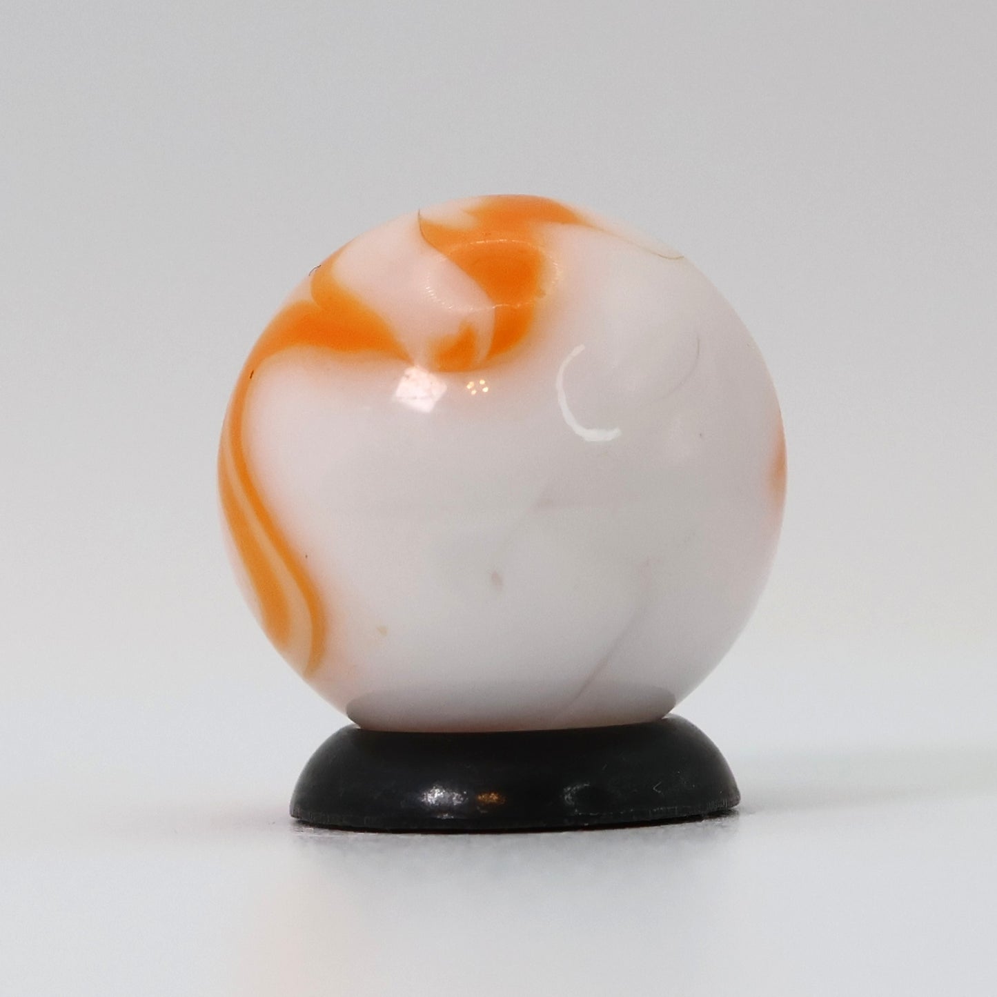 5/8" Swirl Marble Translucent White Base with orange ribbons M-