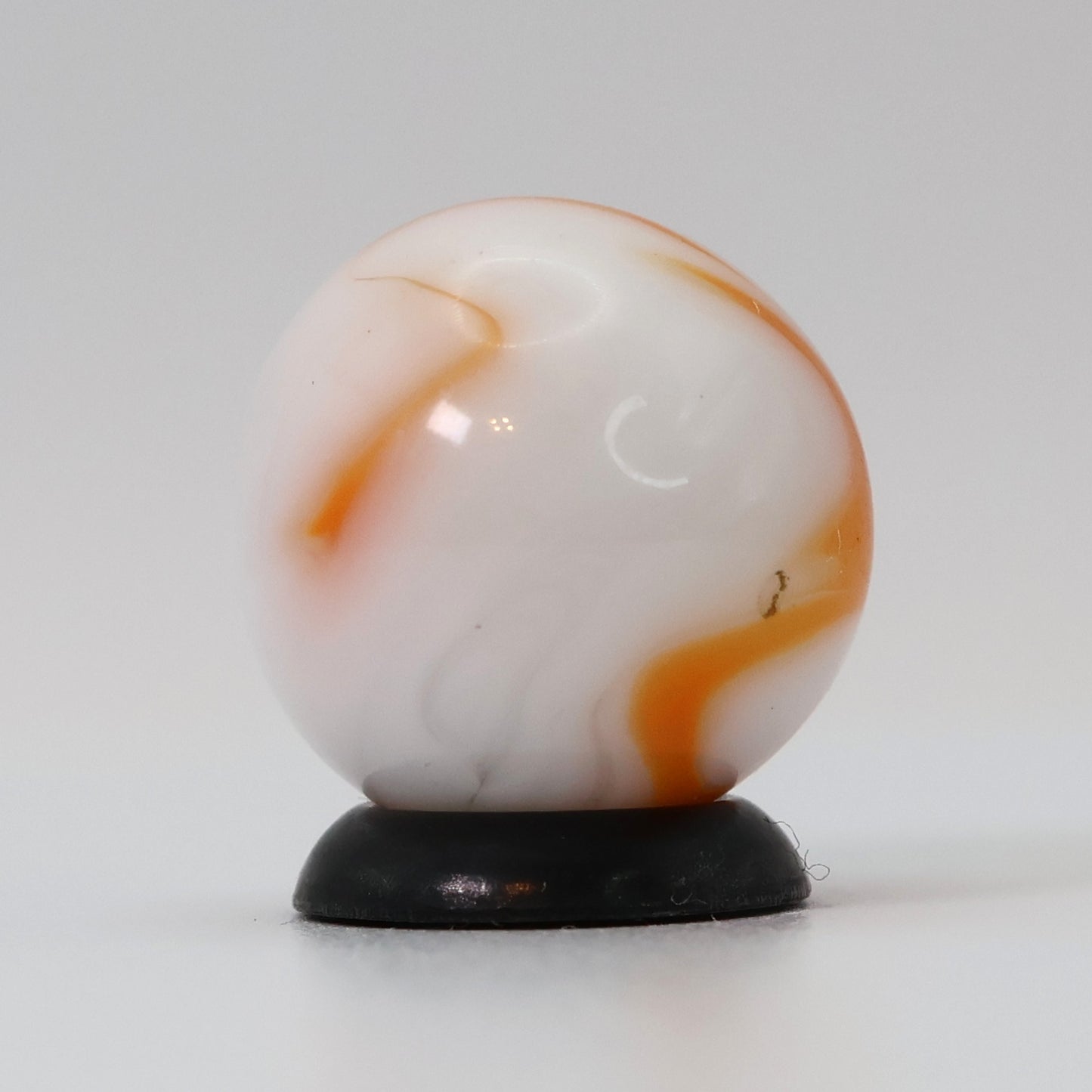 5/8" Swirl Marble Translucent White Base with orange ribbons M-
