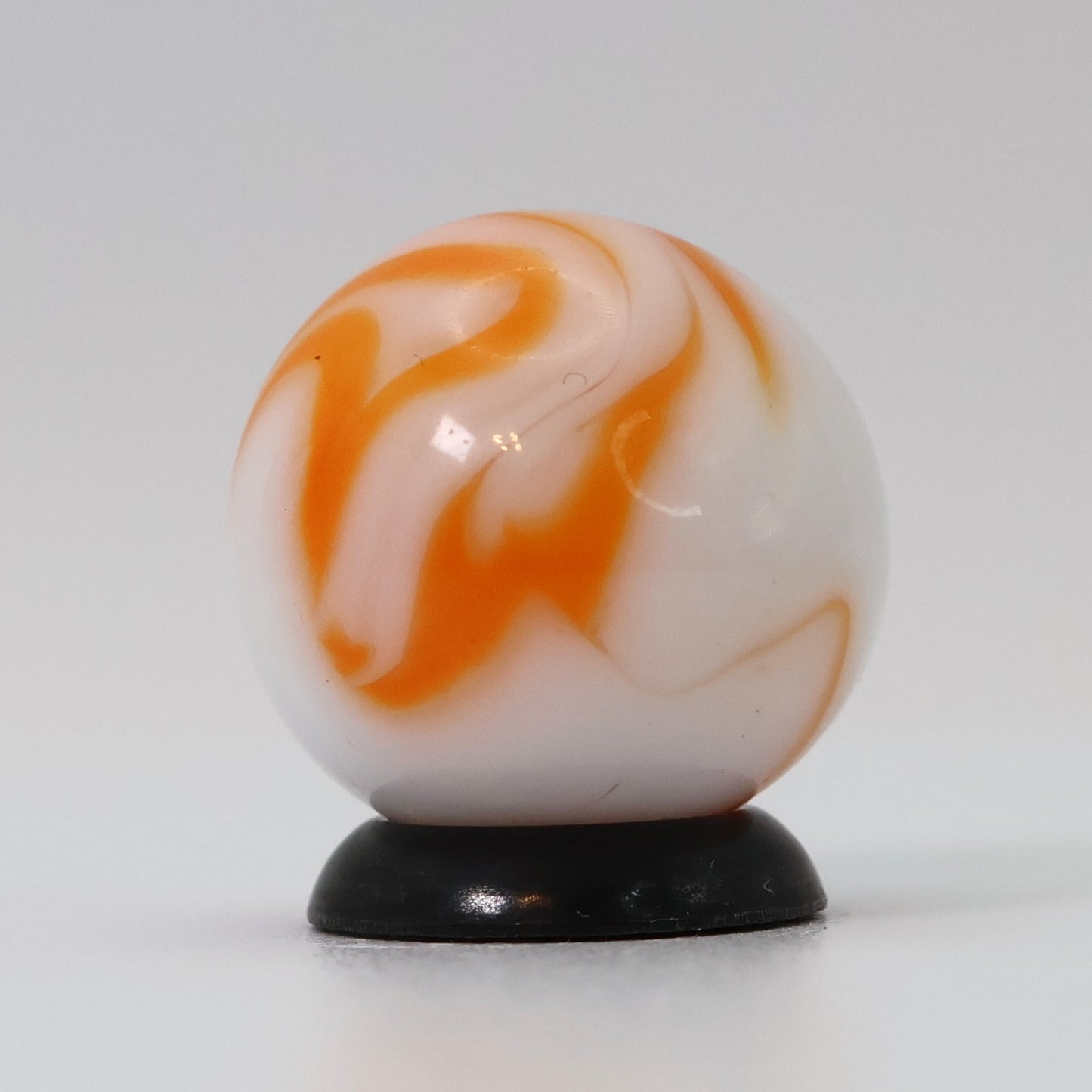 5/8" Swirl Marble Translucent White Base with orange ribbons M-