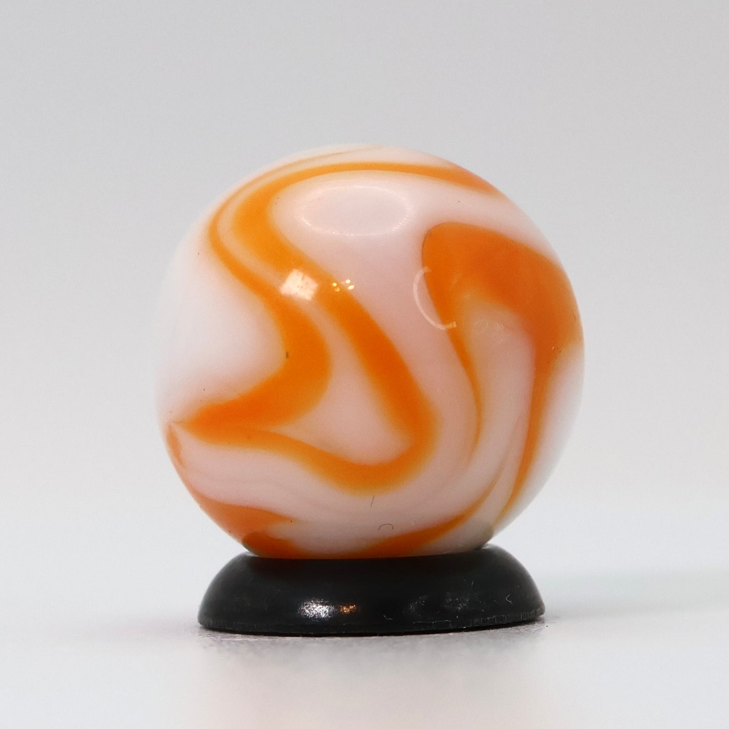 5/8" Swirl Marble Translucent White Base with orange ribbons M-