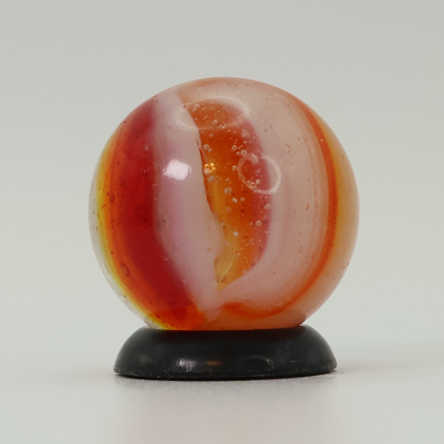 5/8" Peltier Clear Based Rainbo Marble Orange & Red Pronounced Seam UV MINT