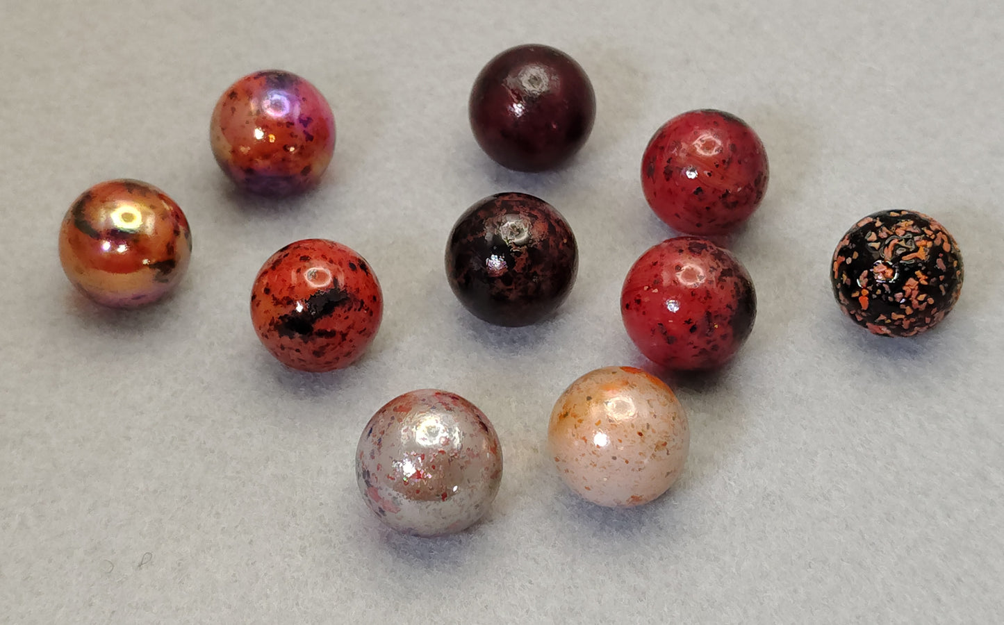10pk of various 5/8" Vacor speckled marbles red white black NM+ to M