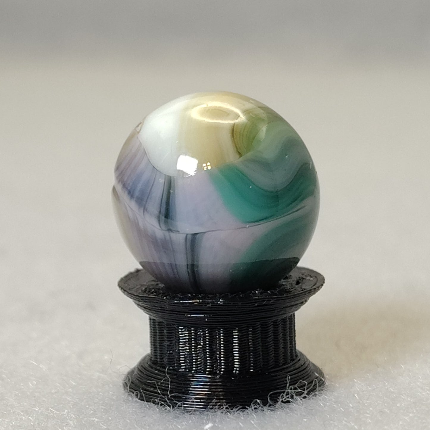 5/8" Jabo marble shiny copper line NM+ bit of UV