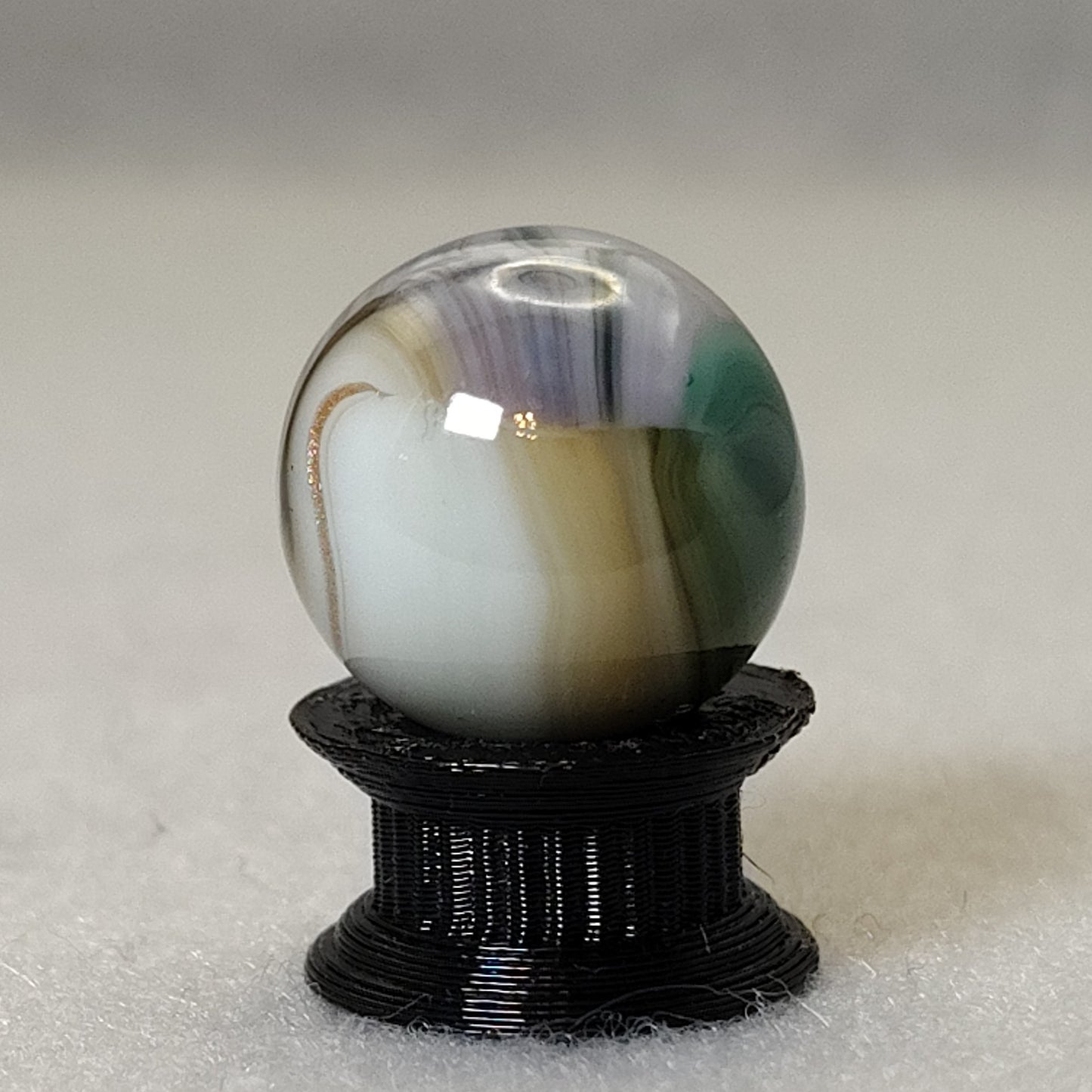 5/8" Jabo marble shiny copper line NM+ bit of UV