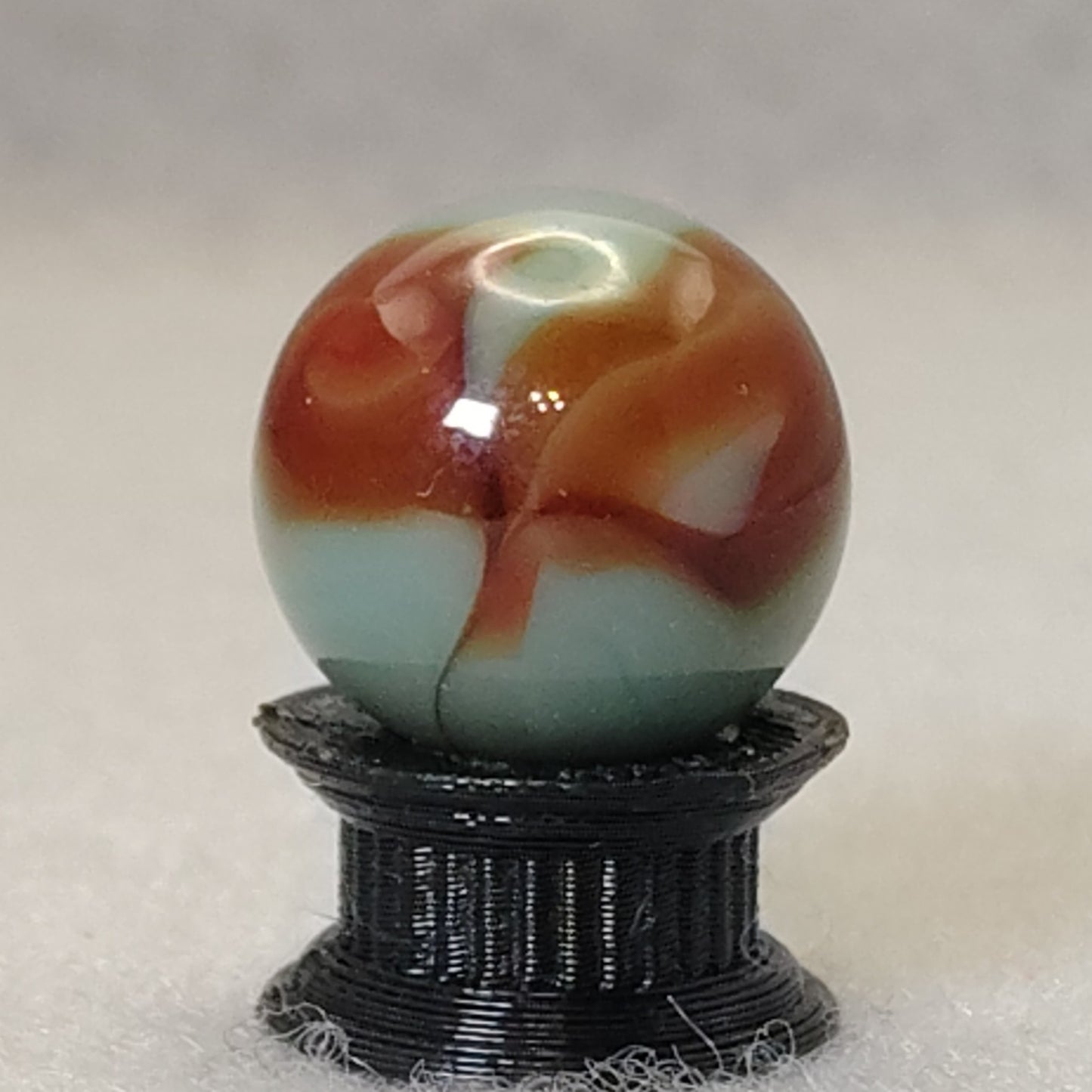 16mm Transparent Teal & Rust Swirl marble - Ravenswood? NM+