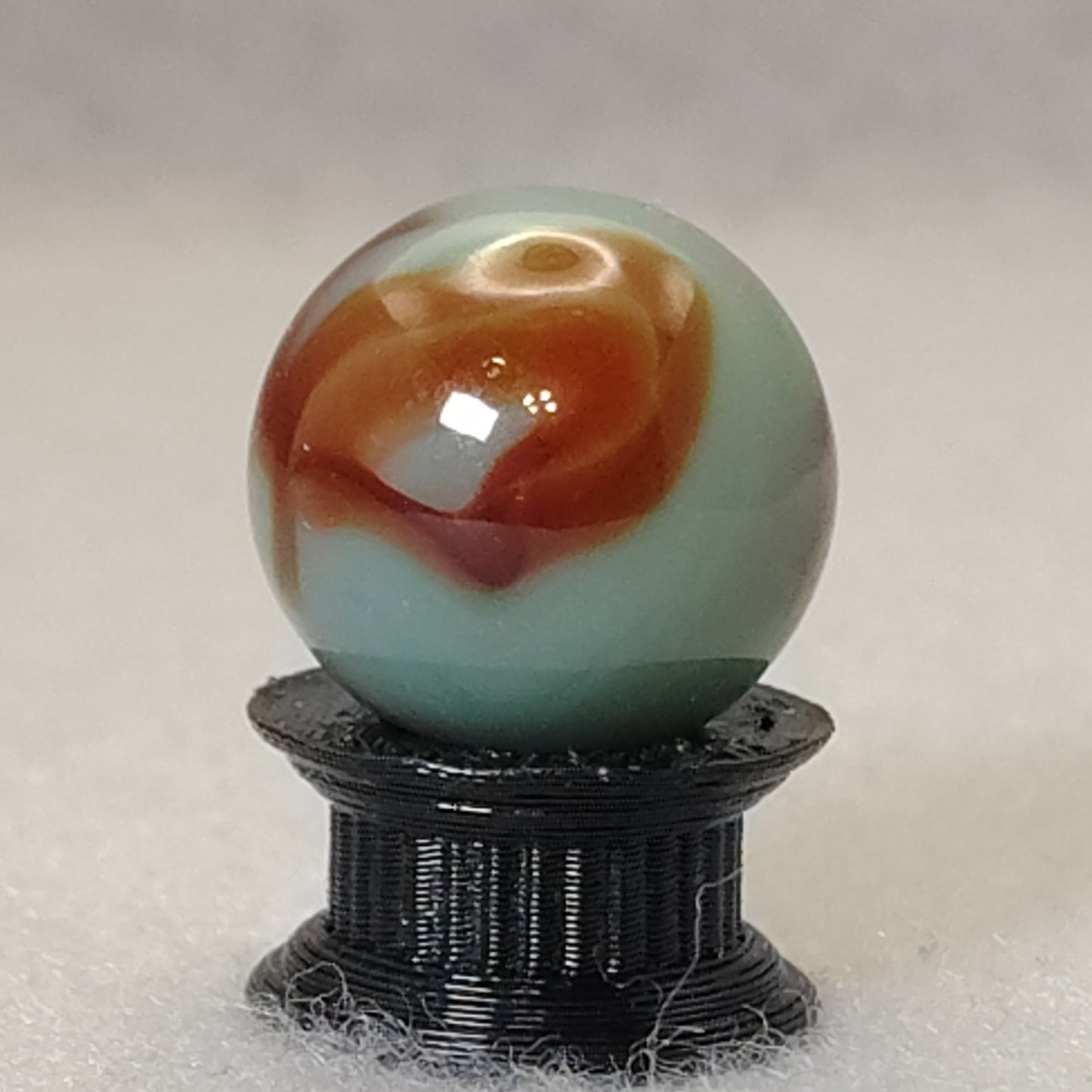 16mm Transparent Teal & Rust Swirl marble - Ravenswood? NM+