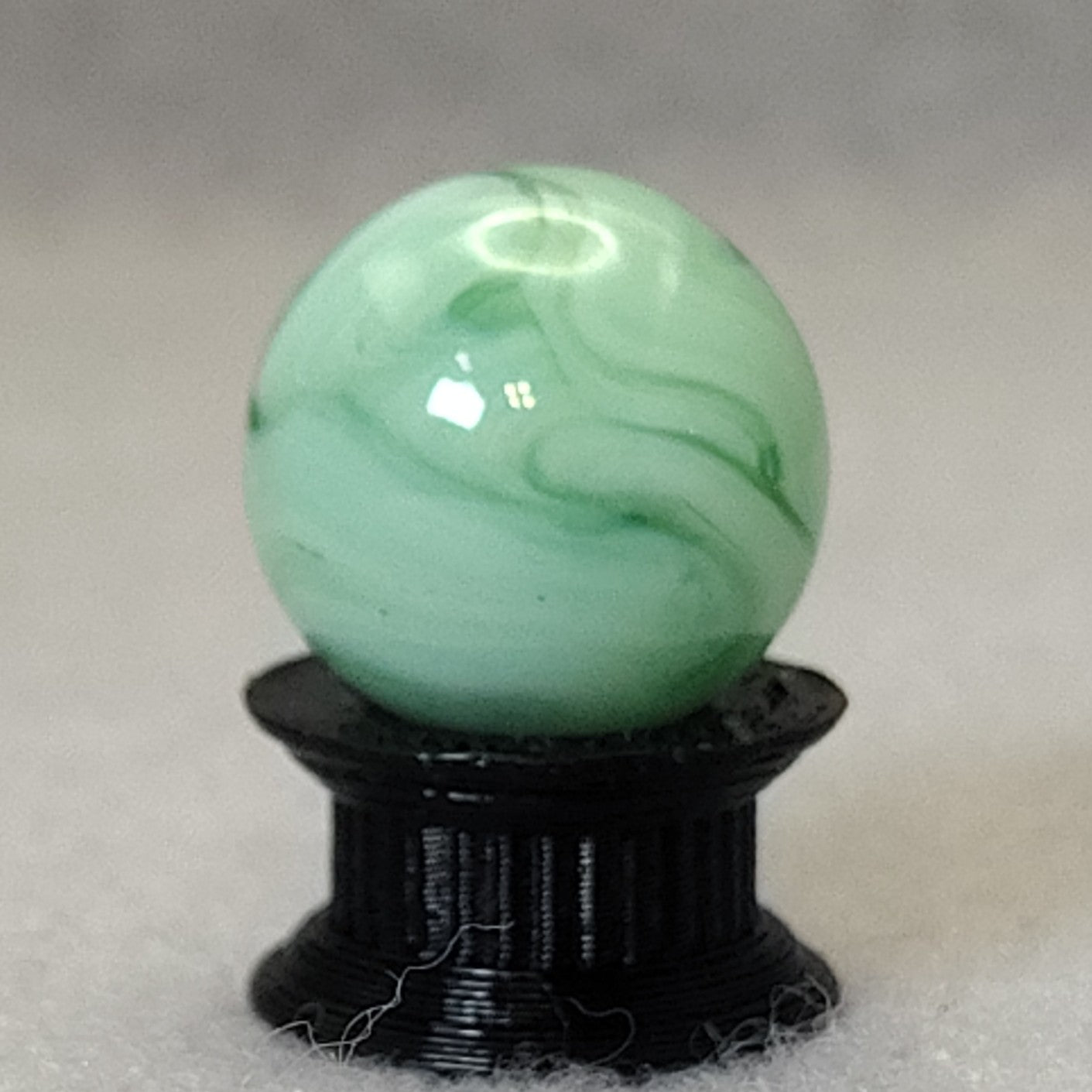 15.5mm Transparent Green & White Swirl Marble Champion? NM