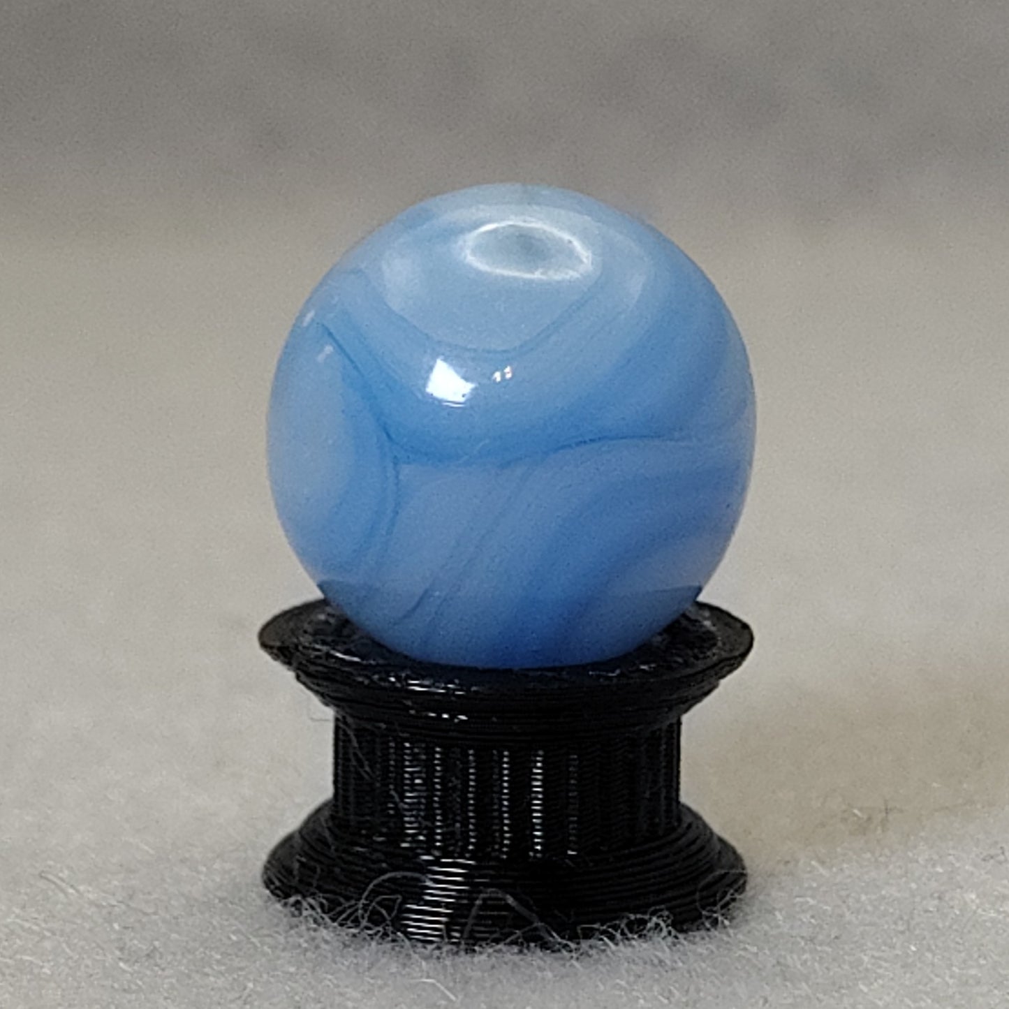 16mm Transparent Swirl Marble w/Blue stripes - Champion?  NM