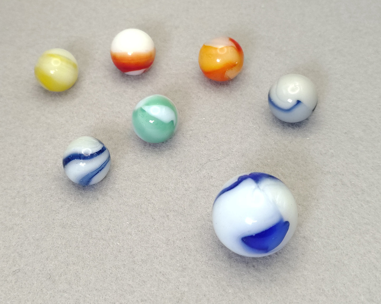 7 pack 9/16-7/8" glowing Peltier Rainbos, Shooter has orange peel feel NM to M