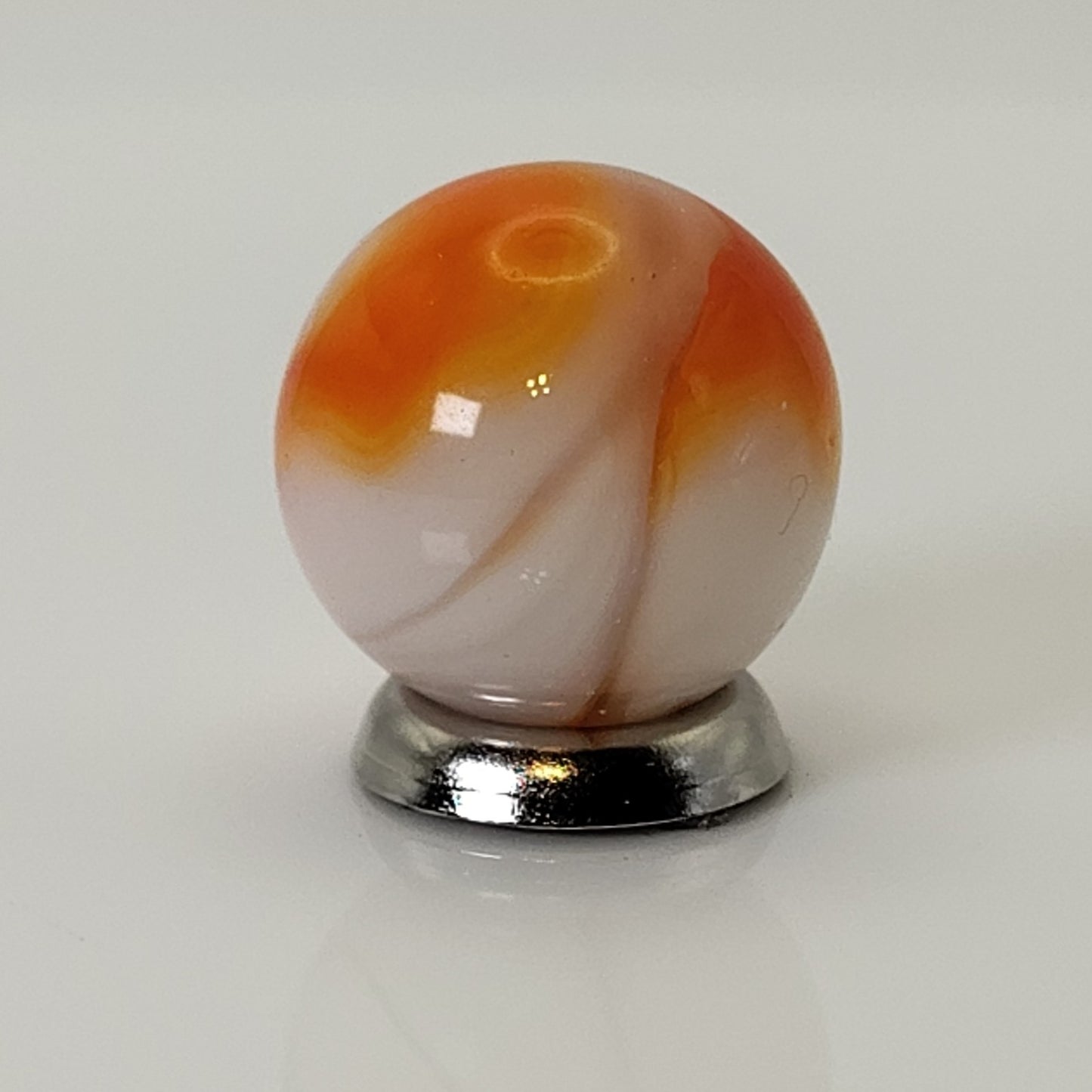5/8" Swirl Marble Orange & White on Clear Base UV Mint