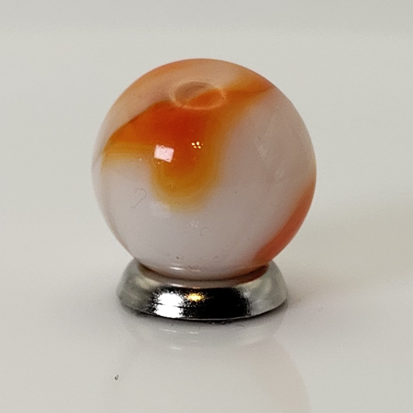 5/8" Swirl Marble Orange & White on Clear Base UV Mint
