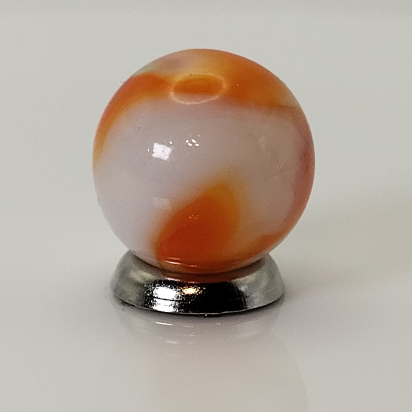 5/8" Swirl Marble Orange & White on Clear Base UV Mint