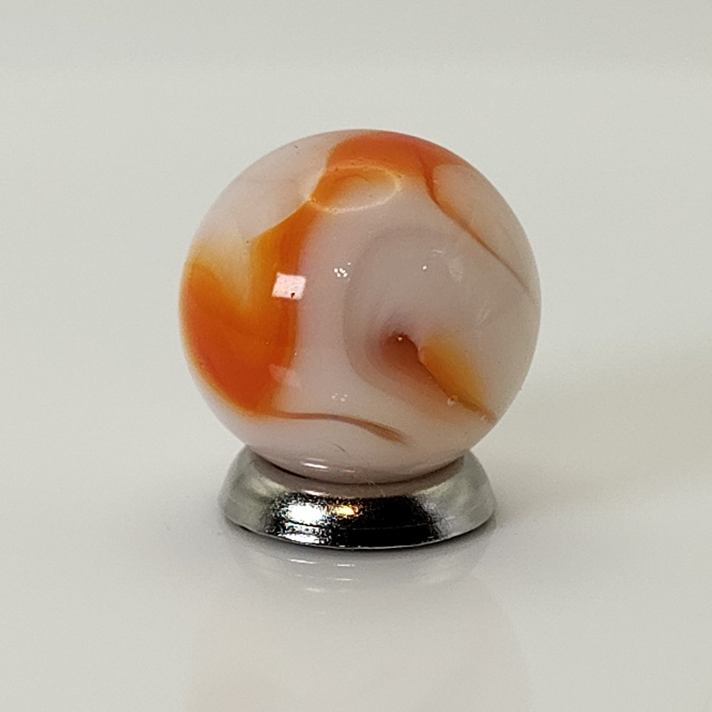5/8" Swirl Marble Orange & White on Clear Base UV Mint