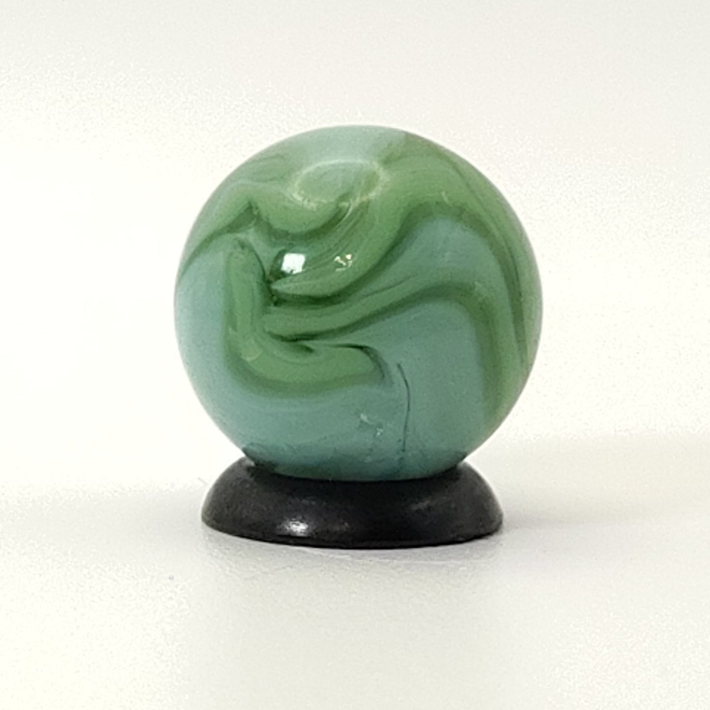 5/8" Swirl Marble Clear Base with green & blue ribbons NM