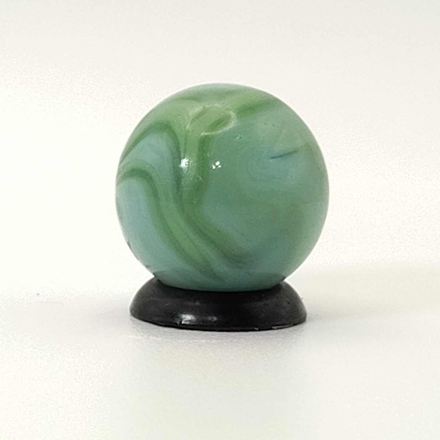 5/8" Swirl Marble Clear Base with green & blue ribbons NM
