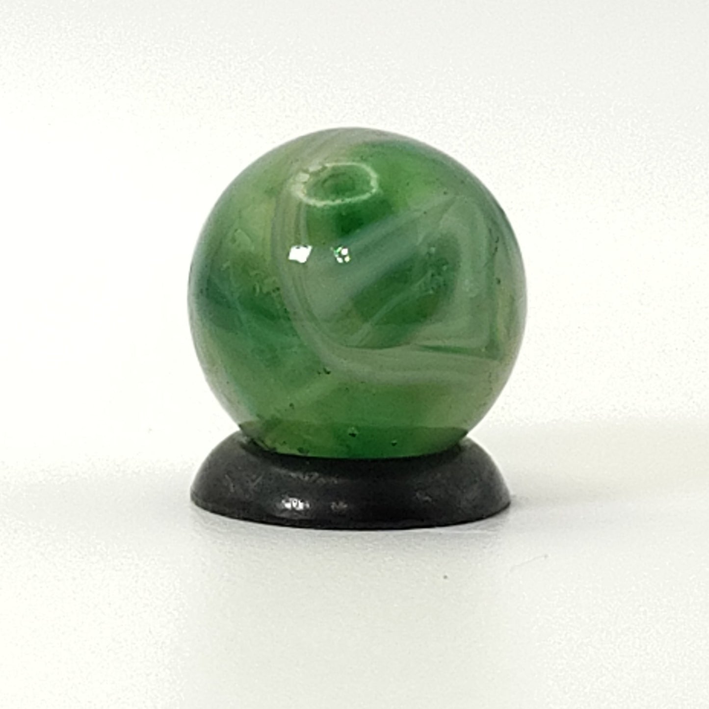 9/16" Swirl Marble green transparent base w/white & tan ribbons great backlit NM