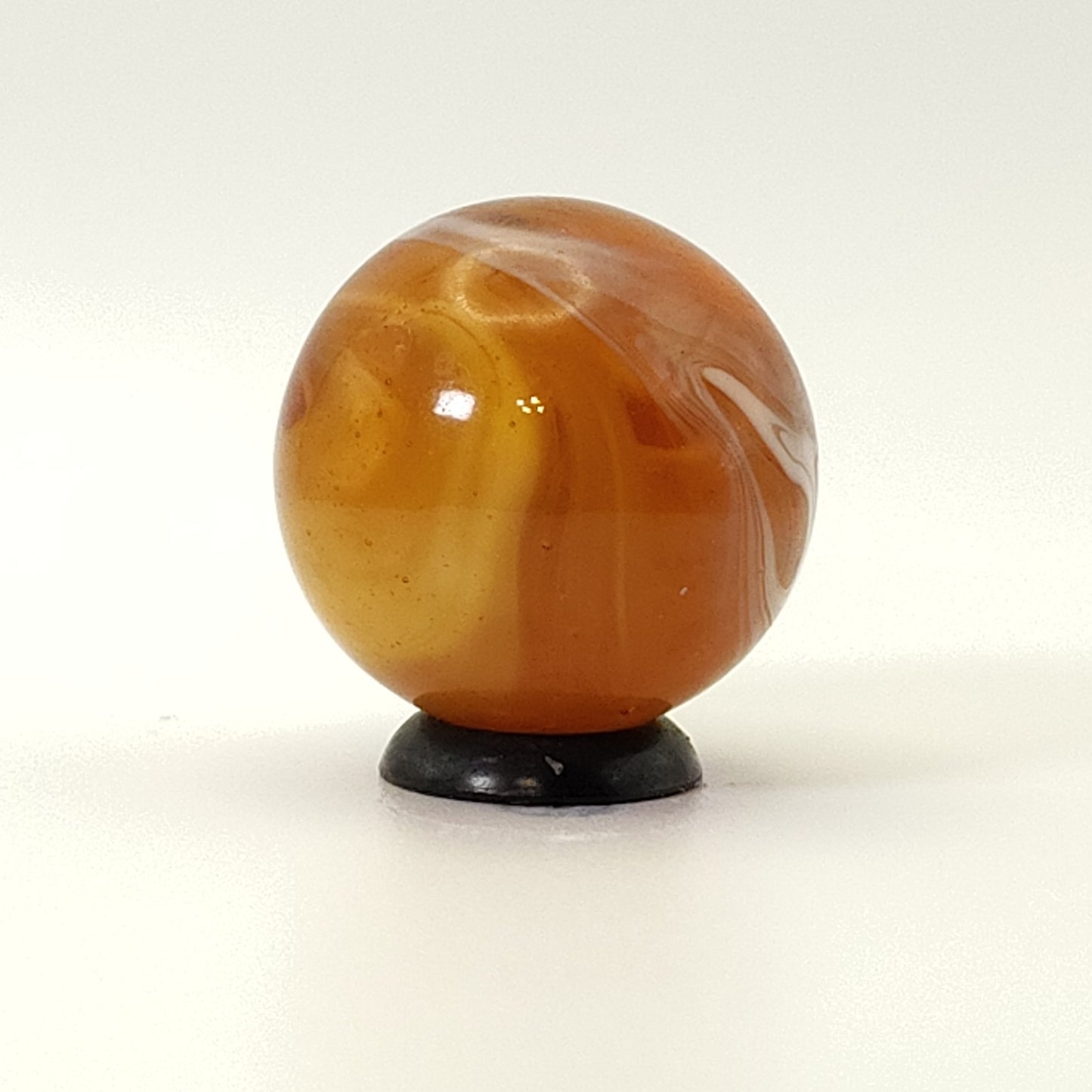 7/8" Amber Slag marble, feathered NM+
