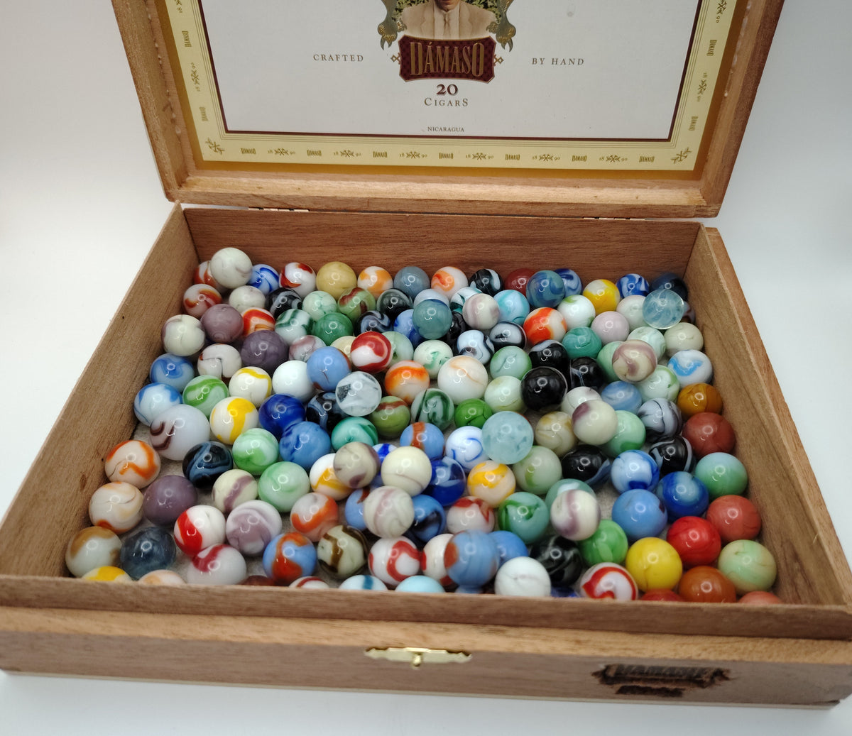 Almost 3lbs of a Variety of Swirl Marbles in a cigar box!  NM-M