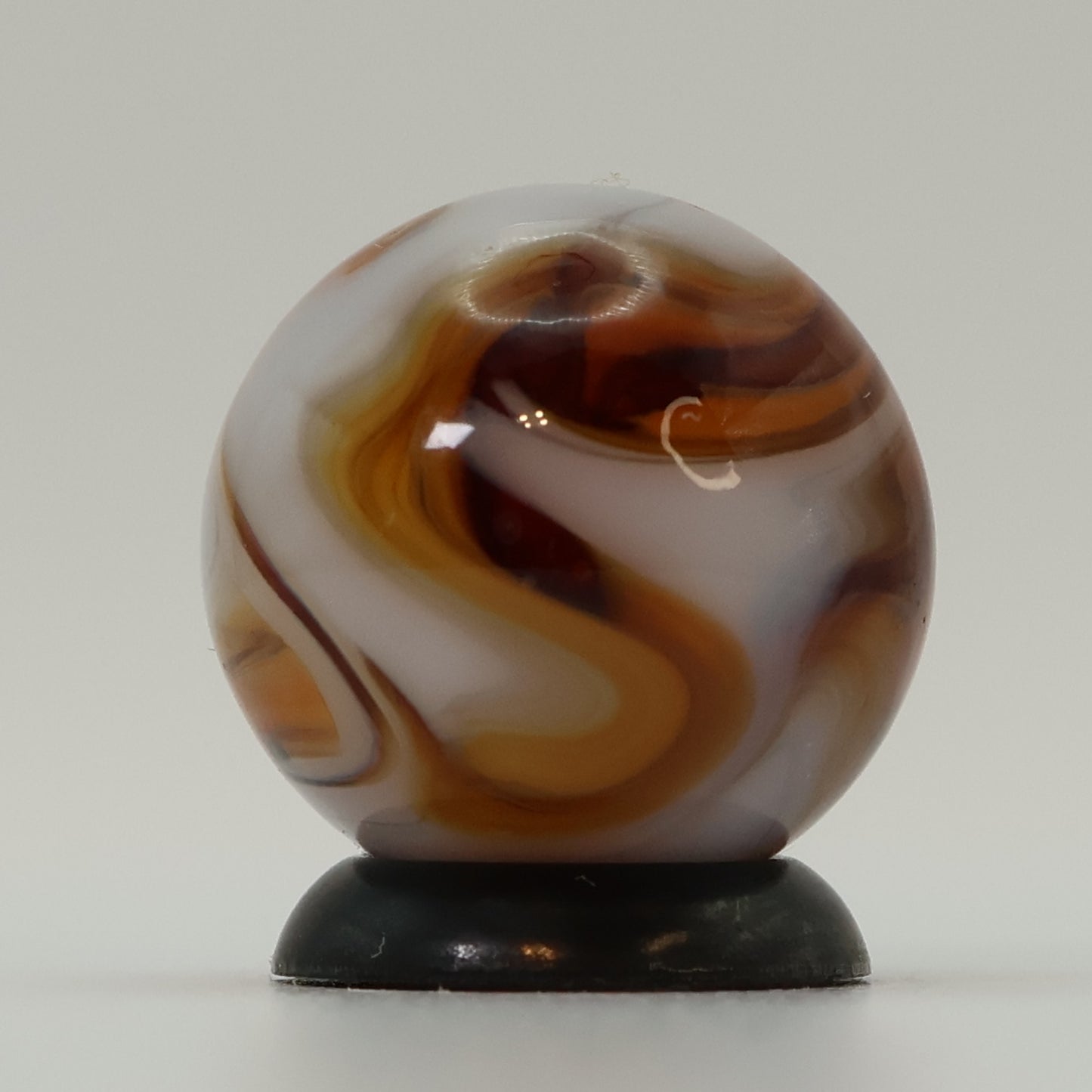 5/8" Gorgeous Swirl Marble Translucent amber base with white ribbons MINT