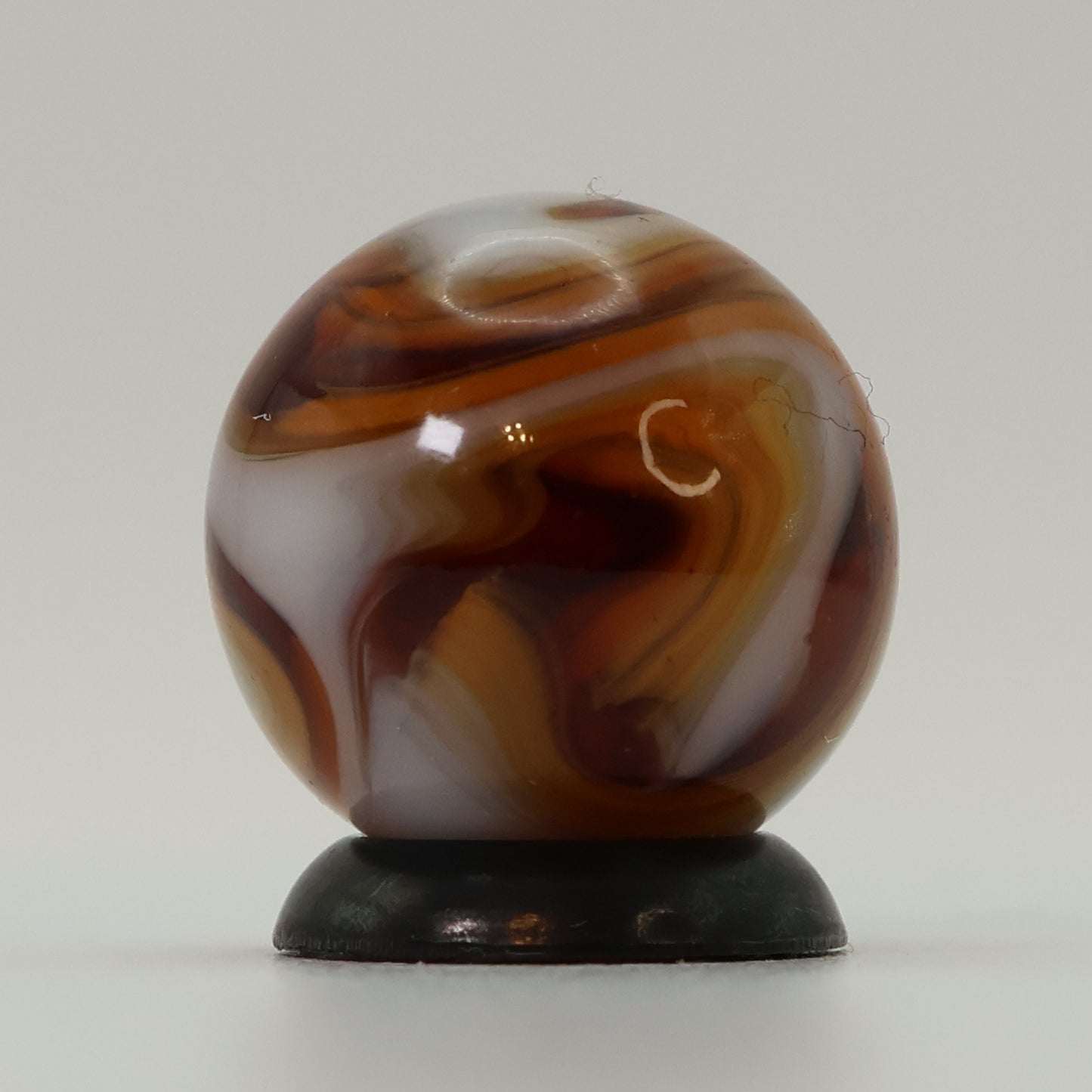 5/8" Gorgeous Swirl Marble Translucent amber base with white ribbons MINT