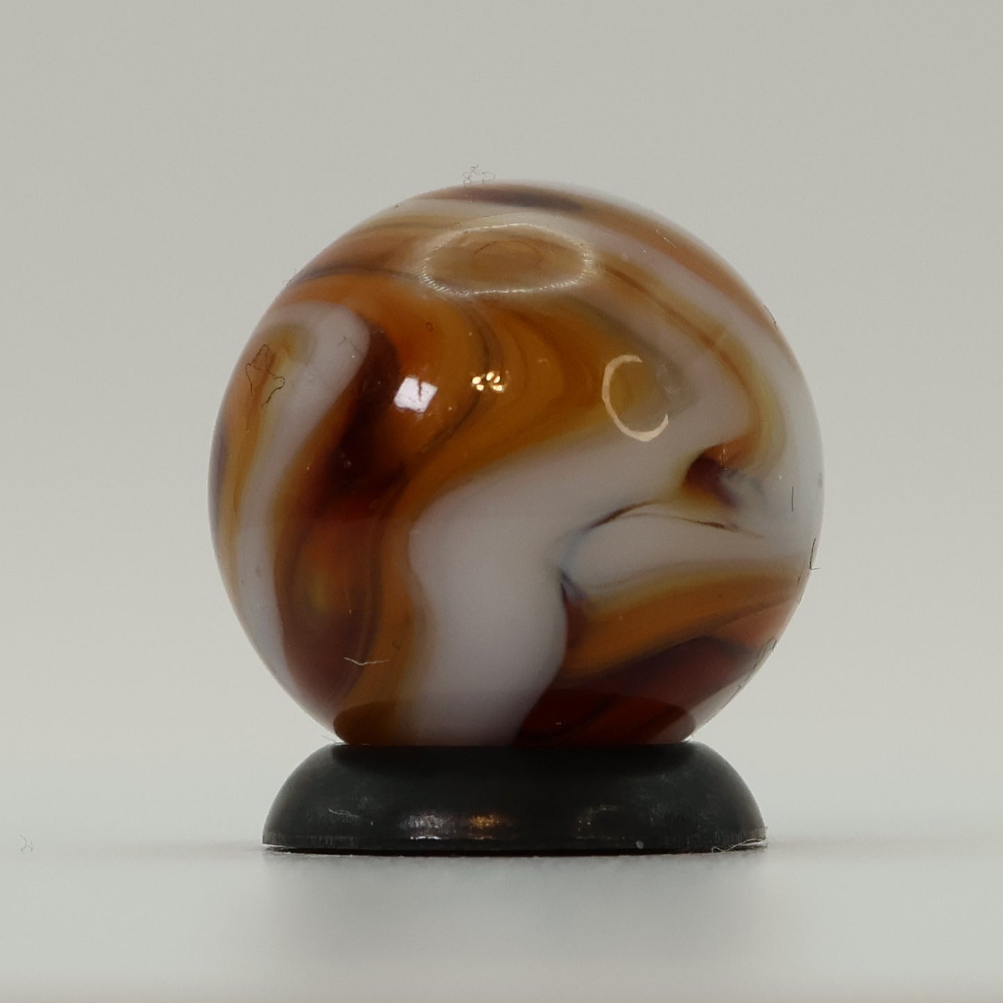 5/8" Gorgeous Swirl Marble Translucent amber base with white ribbons MINT