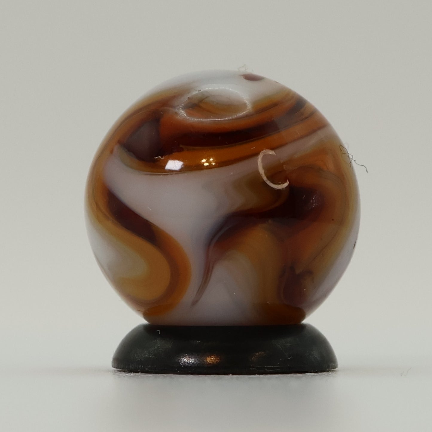 5/8" Gorgeous Swirl Marble Translucent amber base with white ribbons MINT
