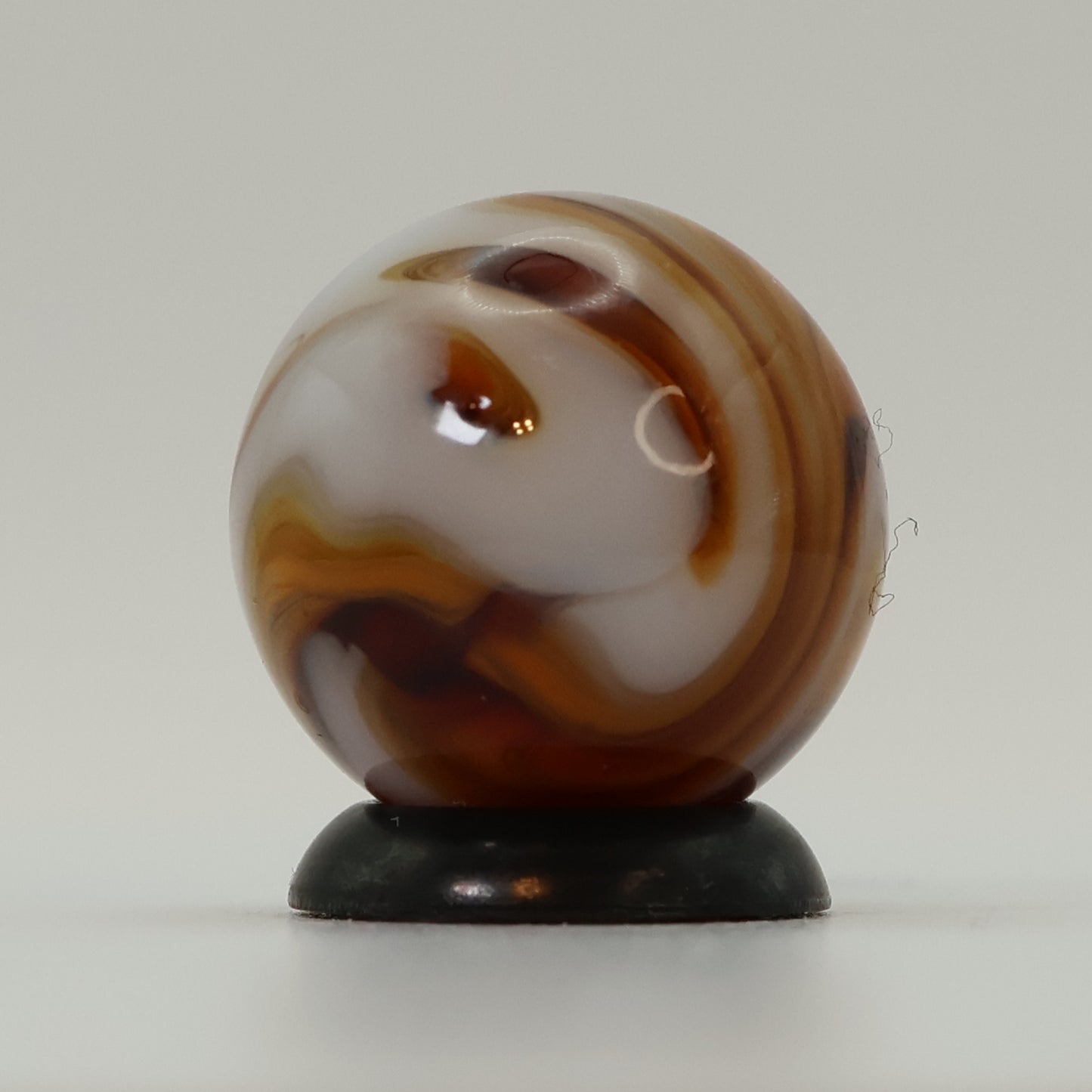 5/8" Gorgeous Swirl Marble Translucent amber base with white ribbons MINT