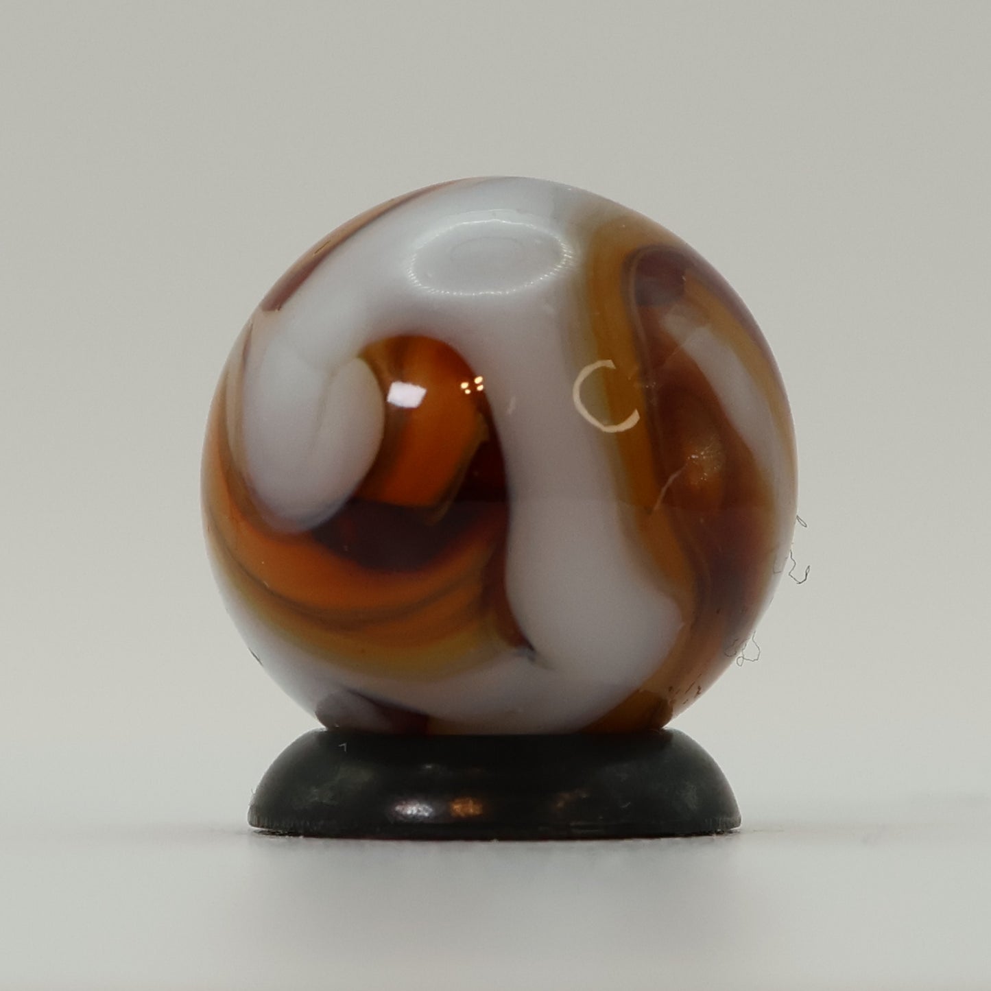5/8" Gorgeous Swirl Marble Translucent amber base with white ribbons MINT