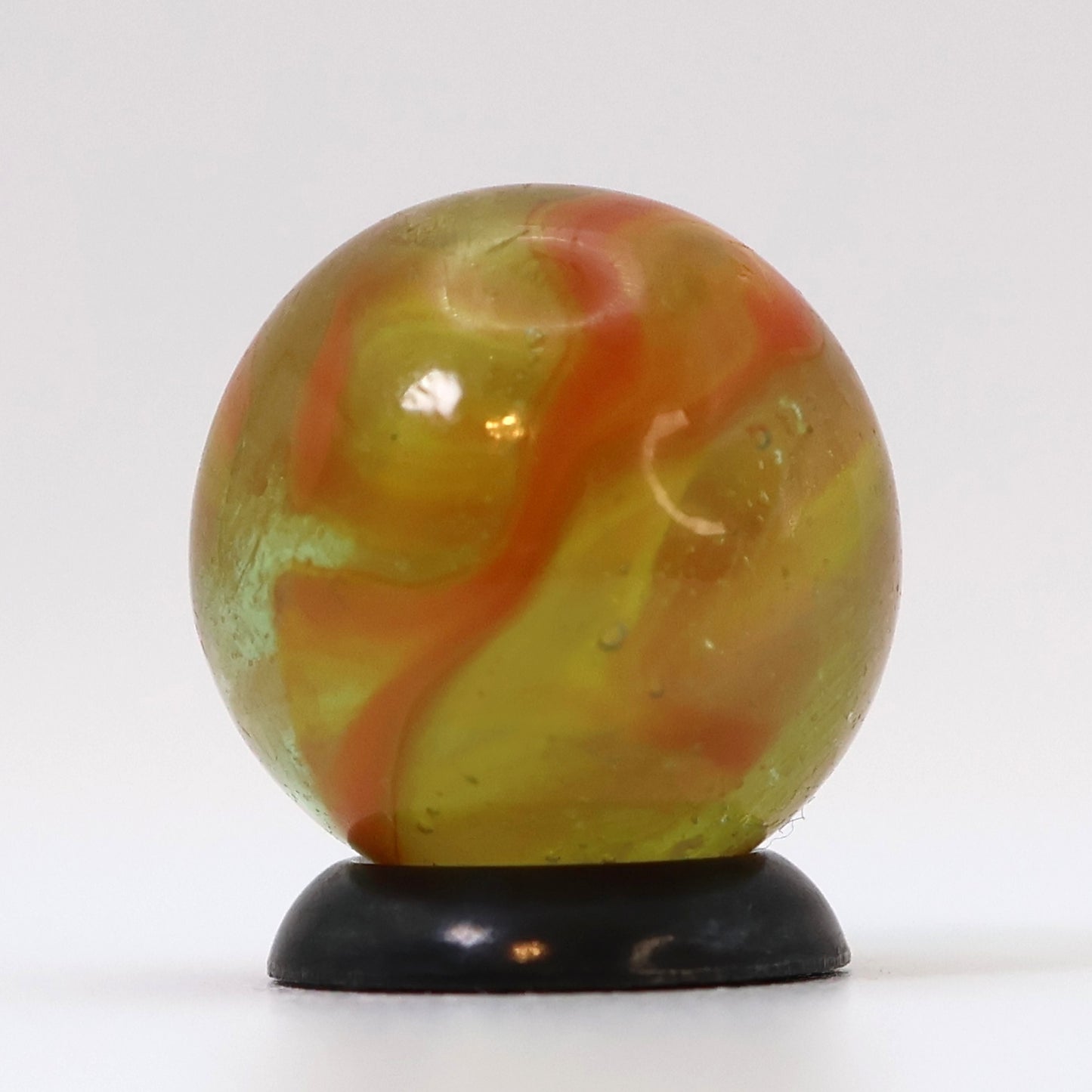 5/8" Swirl (possible wire pull) Marble Clear Base Orange & Yellow Ribbons UV NM+