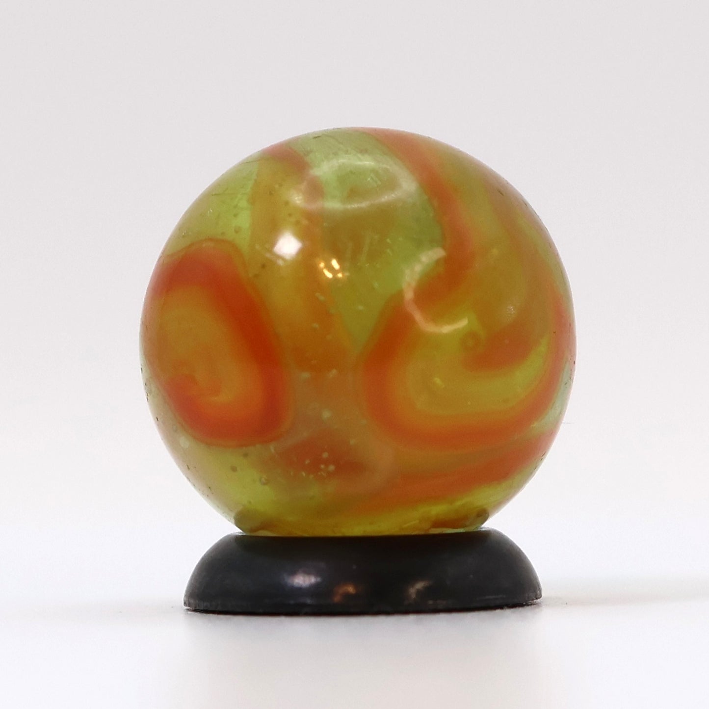 5/8" Swirl (possible wire pull) Marble Clear Base Orange & Yellow Ribbons UV NM+