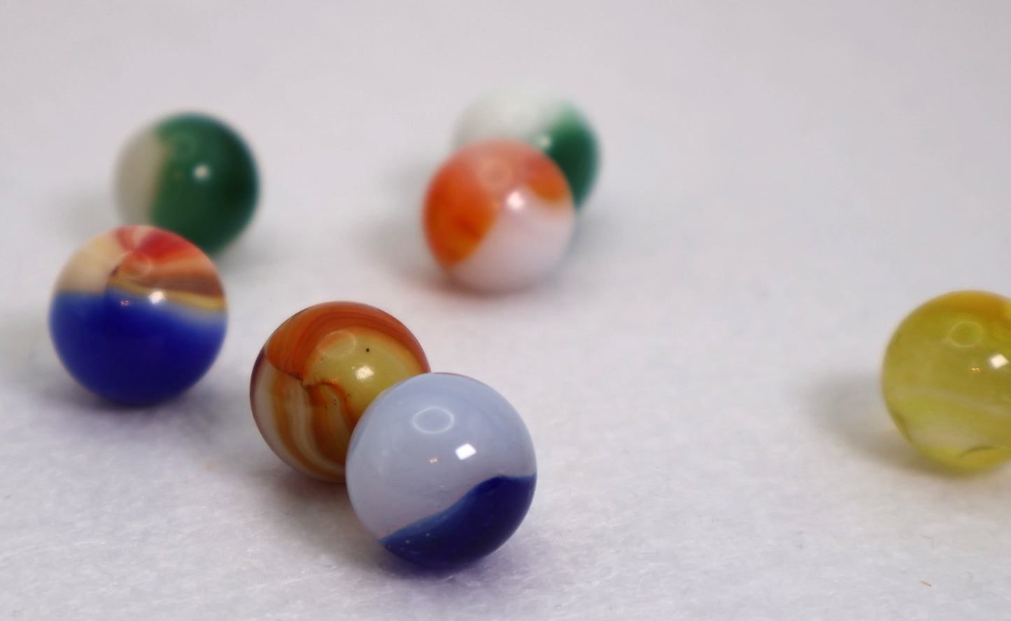 7pk 5/8" Akro Agate Patch Marbles NM-M