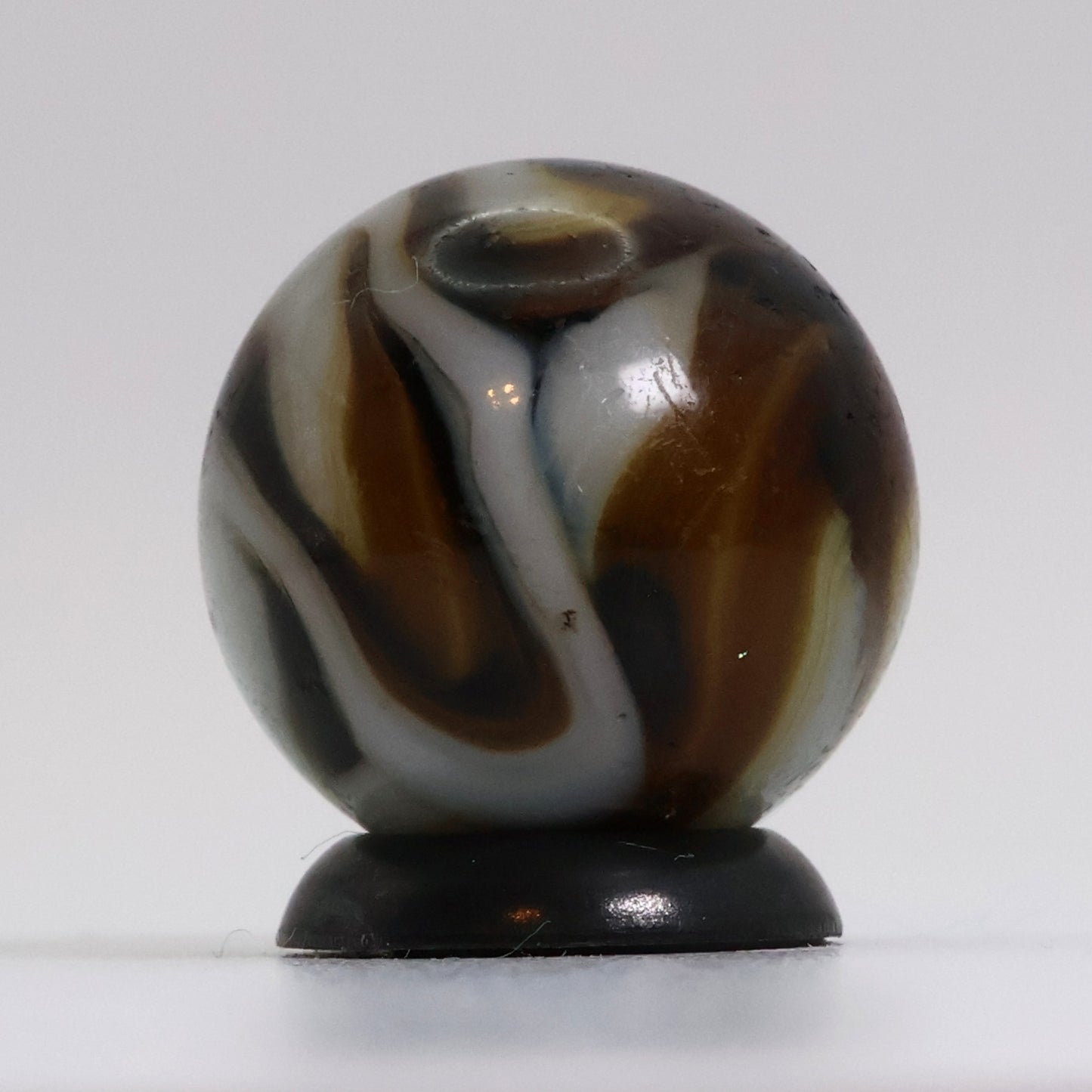 5/8" Translucent Swirl Marble Brown & White NM-